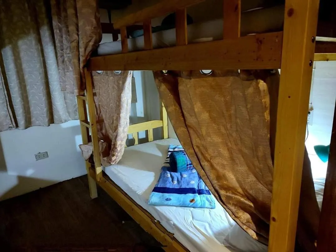 Bed in AlonaBeach Tourist Inn