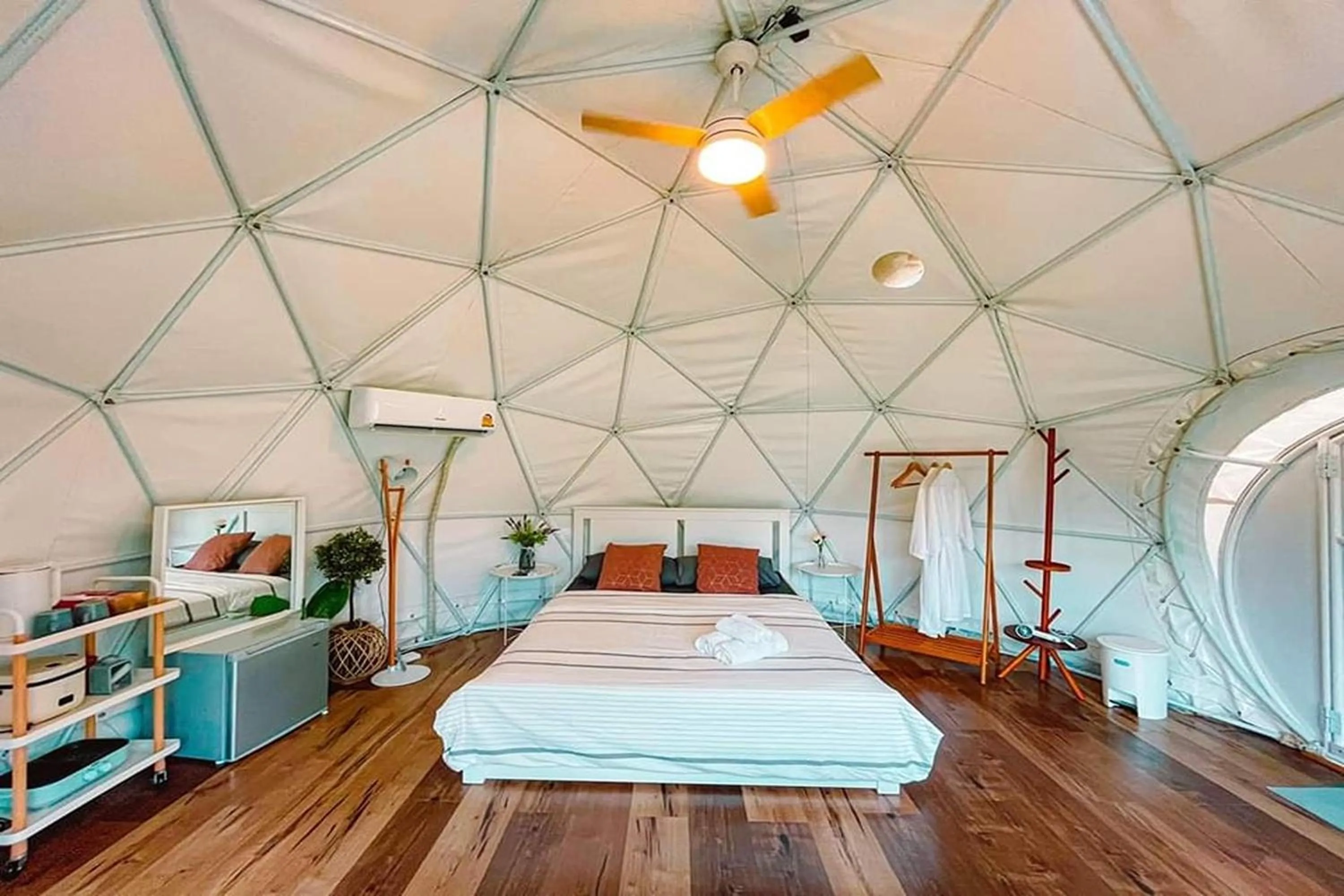 Bed in NaNine Glamping