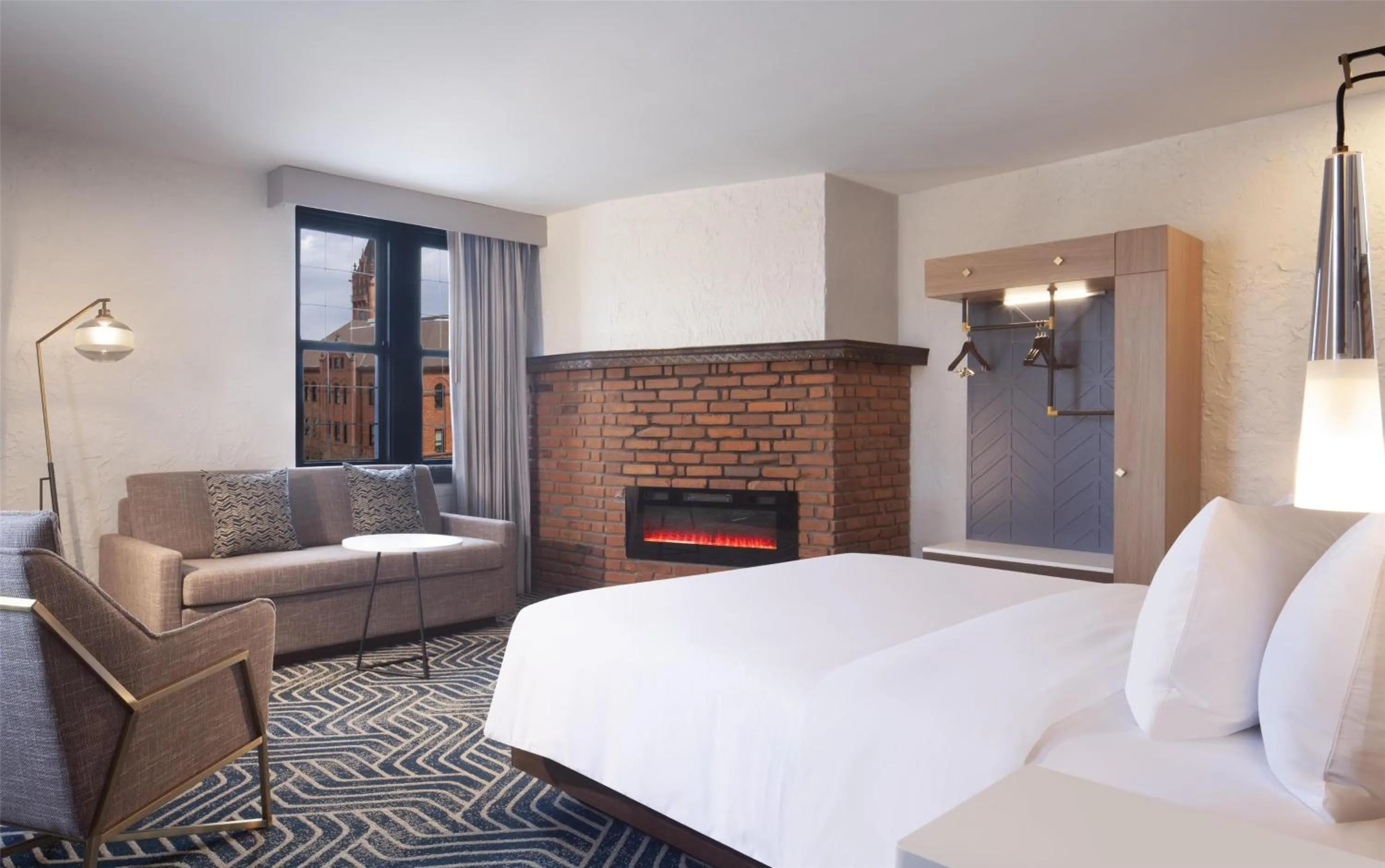 Living room, Bed in Hotel Royer Urbana Champaign, Tapestry Collection by Hilton