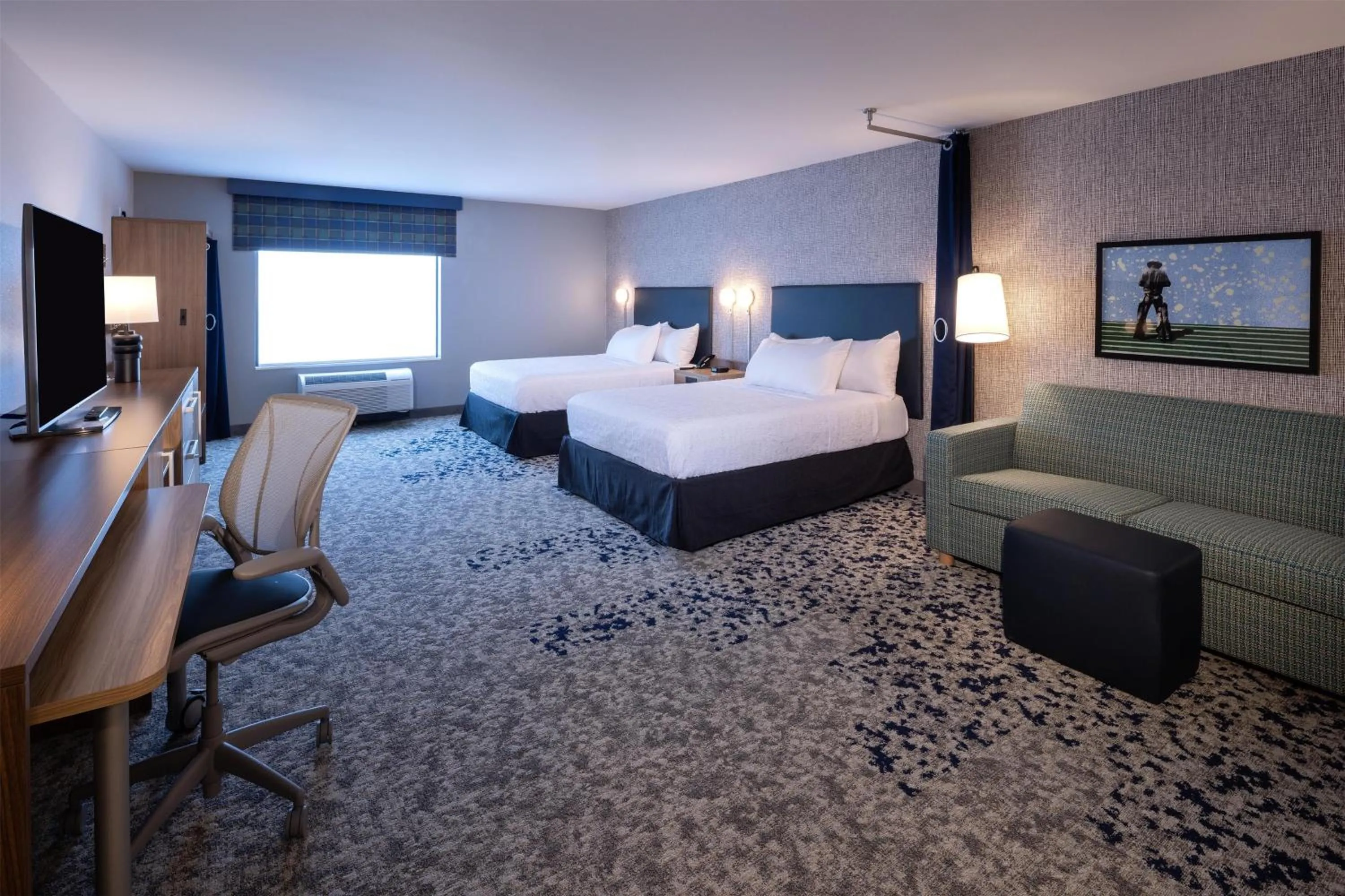 Living room, Bed in Home2 Suites By Hilton Kalispell, Mt