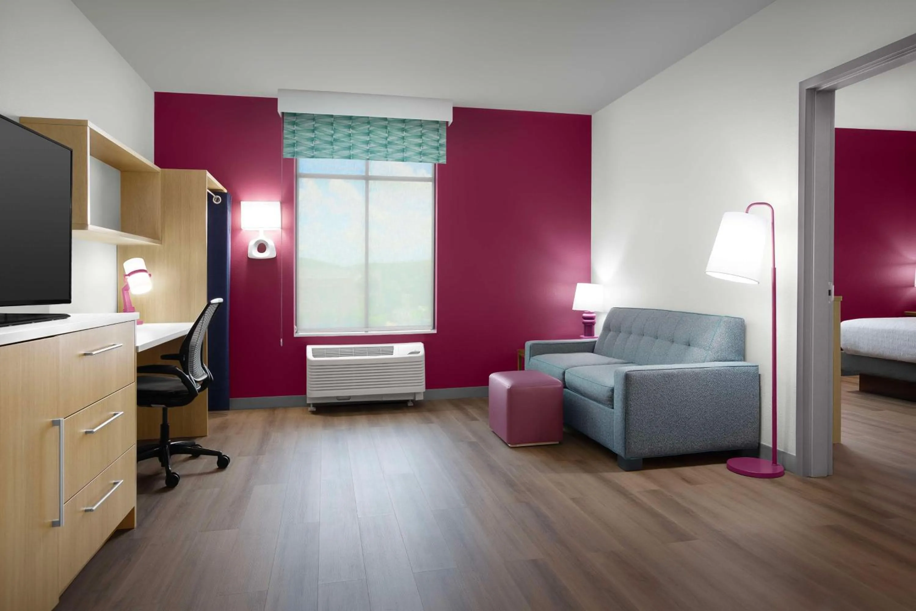 Living room, Bed in Home2 Suites by Hilton Clarksville/Ft. Campbell