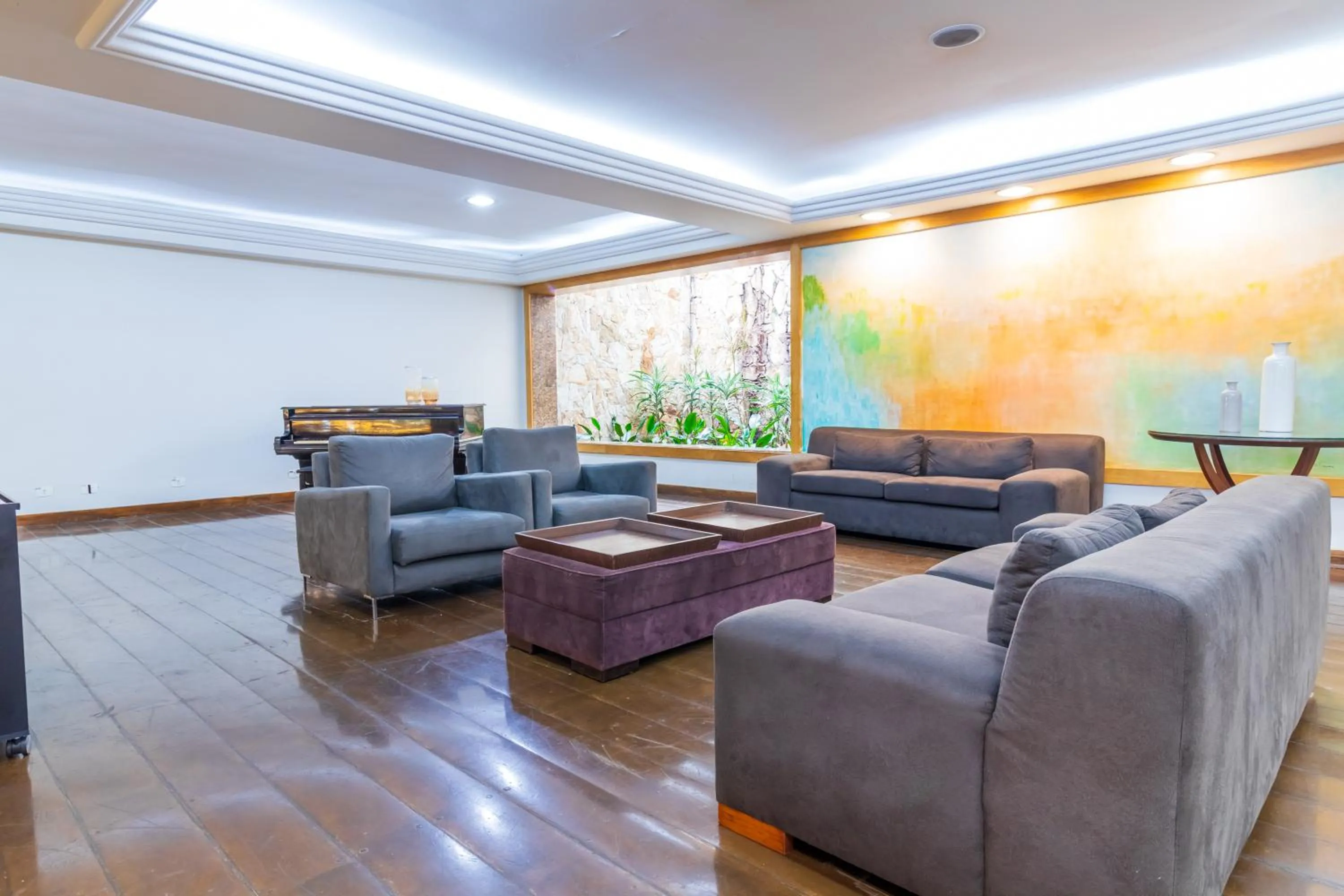 Living room in Braston Augusta Hotel by Castelo Itaipava