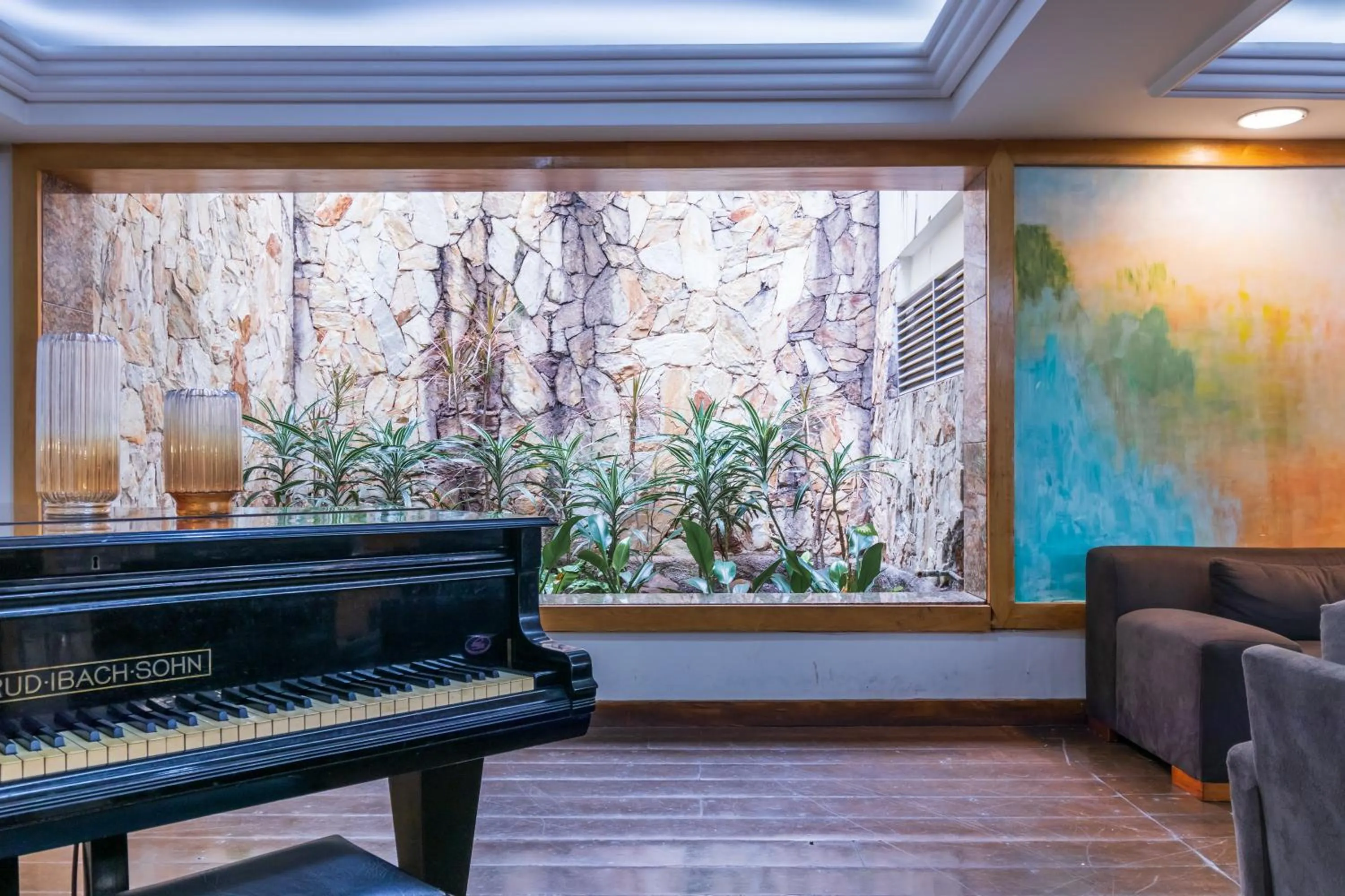 Living room in Braston Augusta Hotel by Castelo Itaipava