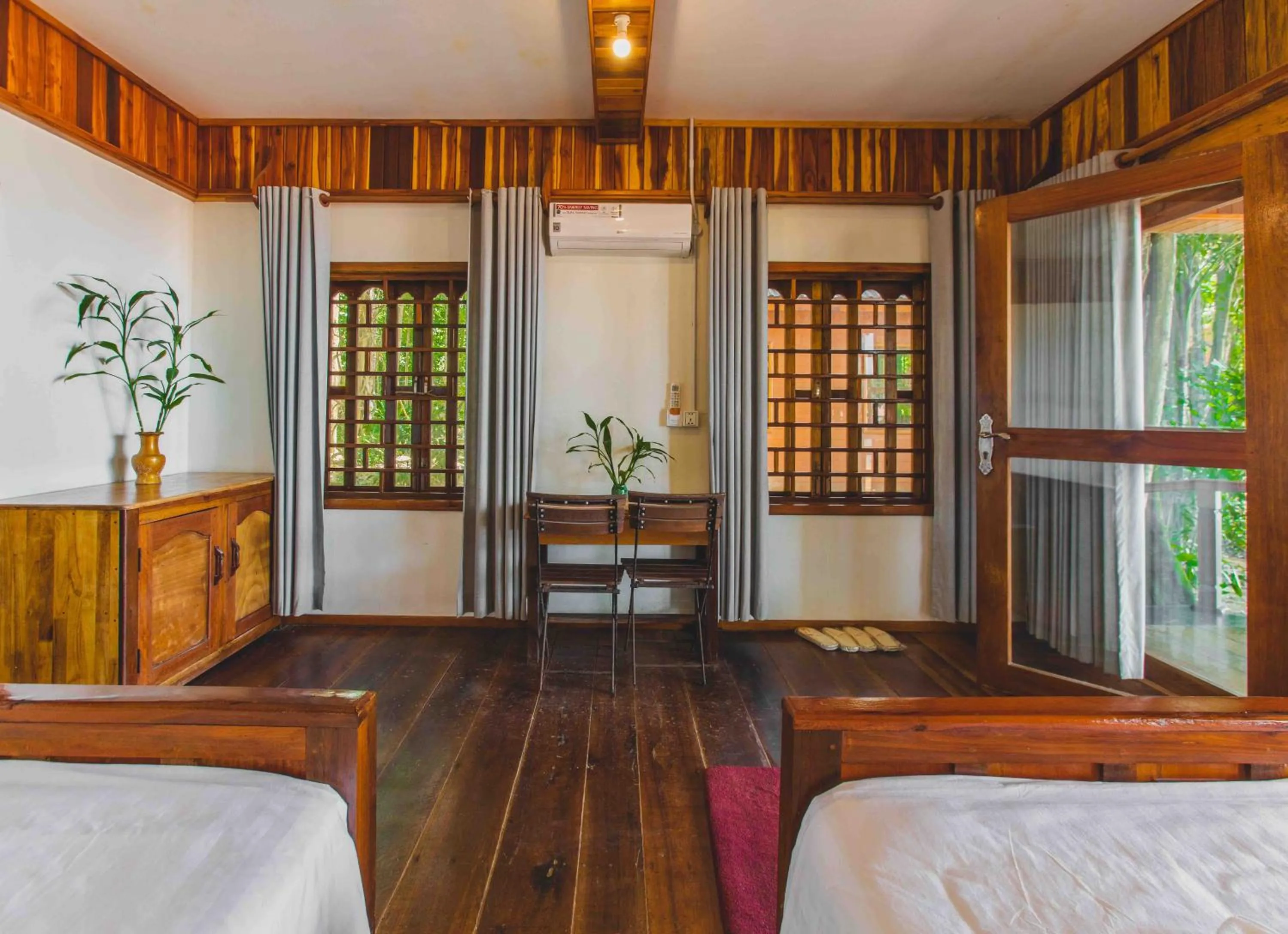 Bed in Tree House Bungalows