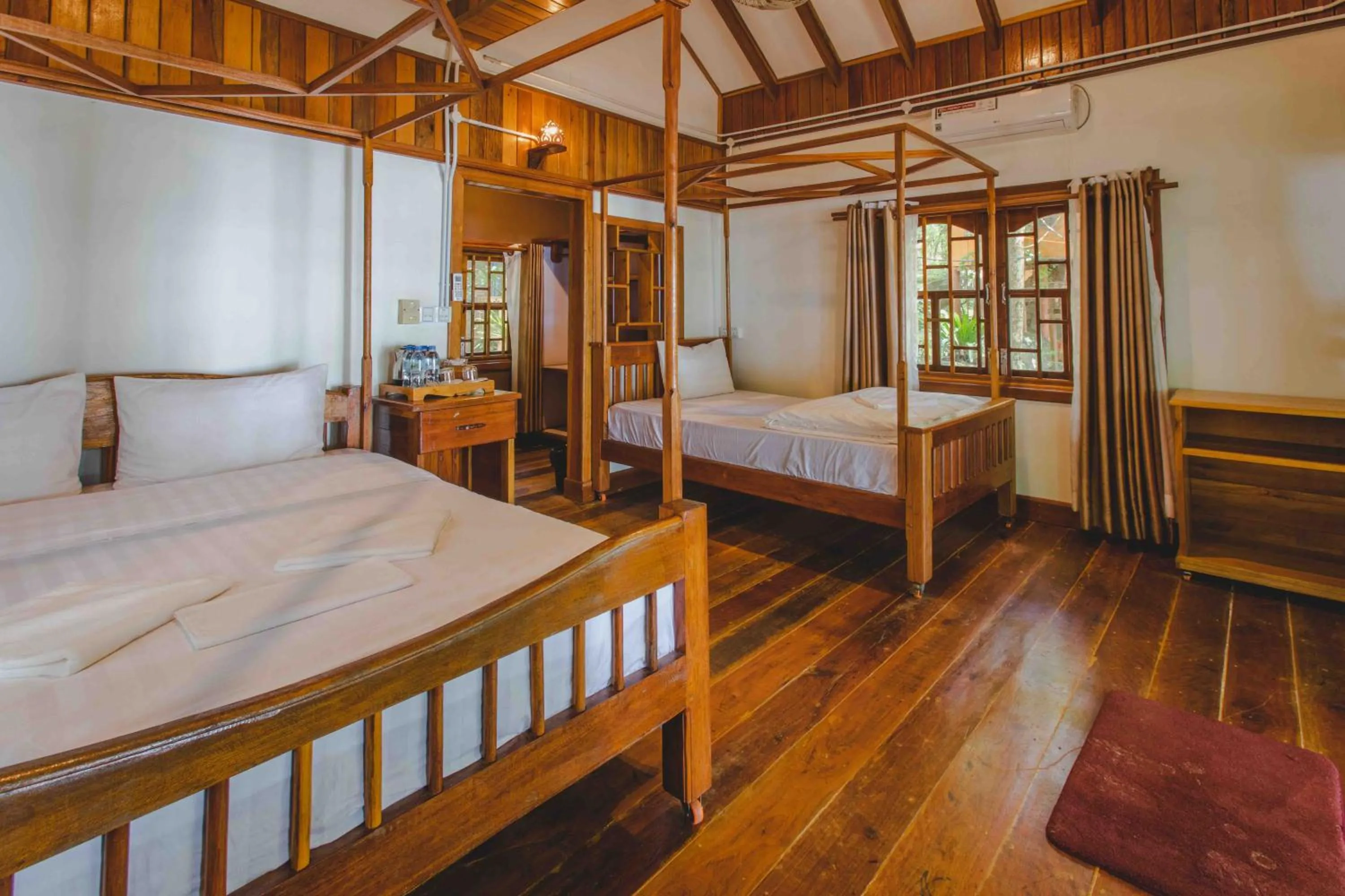 Bed in Tree House Bungalows