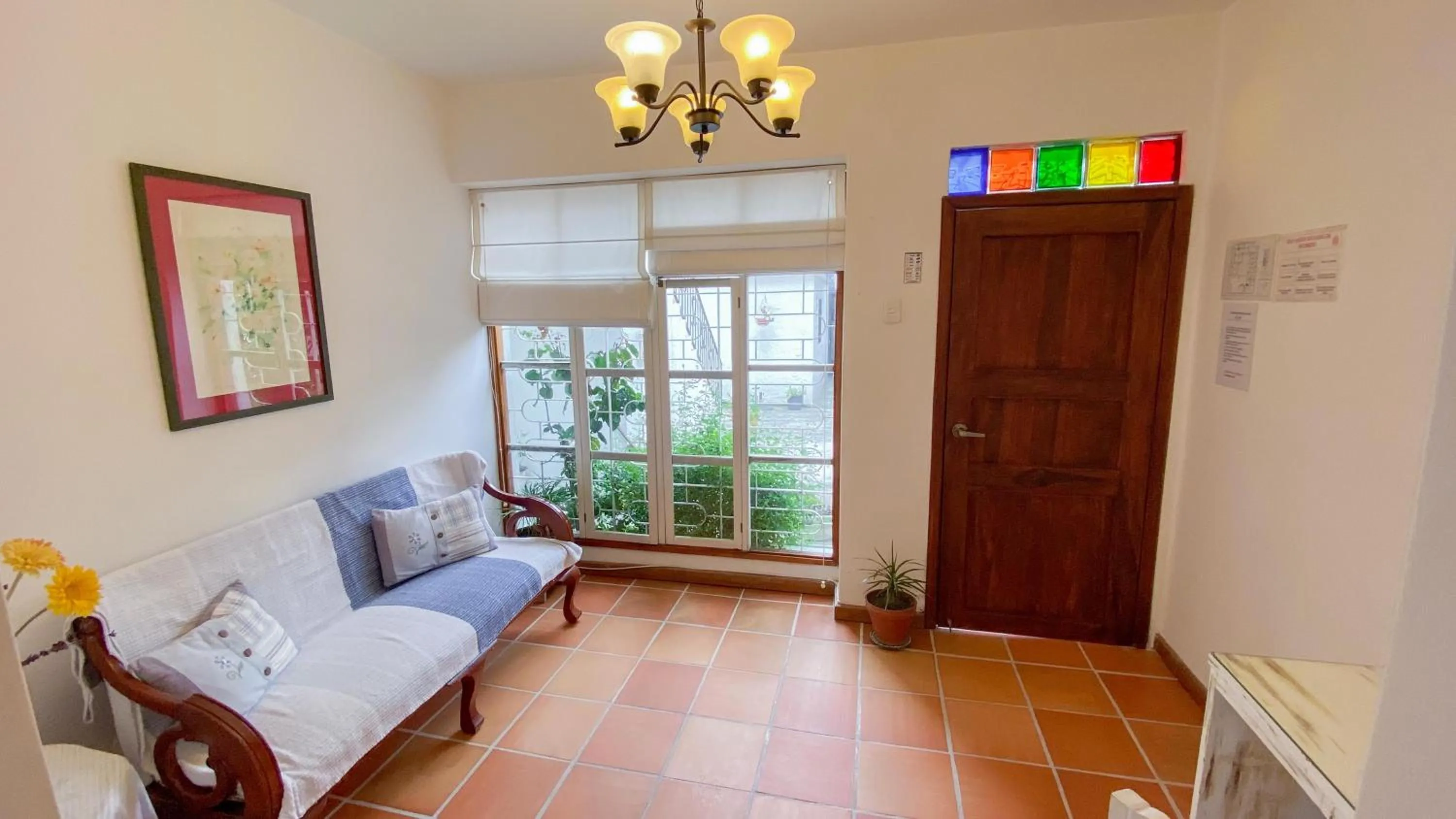 Seating area, Bed in Sakti Hostal B&B