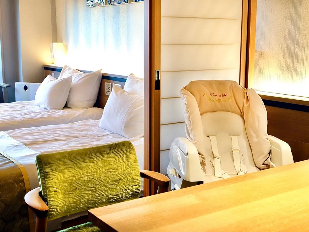 Photo of the whole room, Bed in Sun Urashima Yuki no Sato