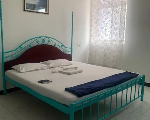 Bed in Shangrila Majorda Beach Hotel