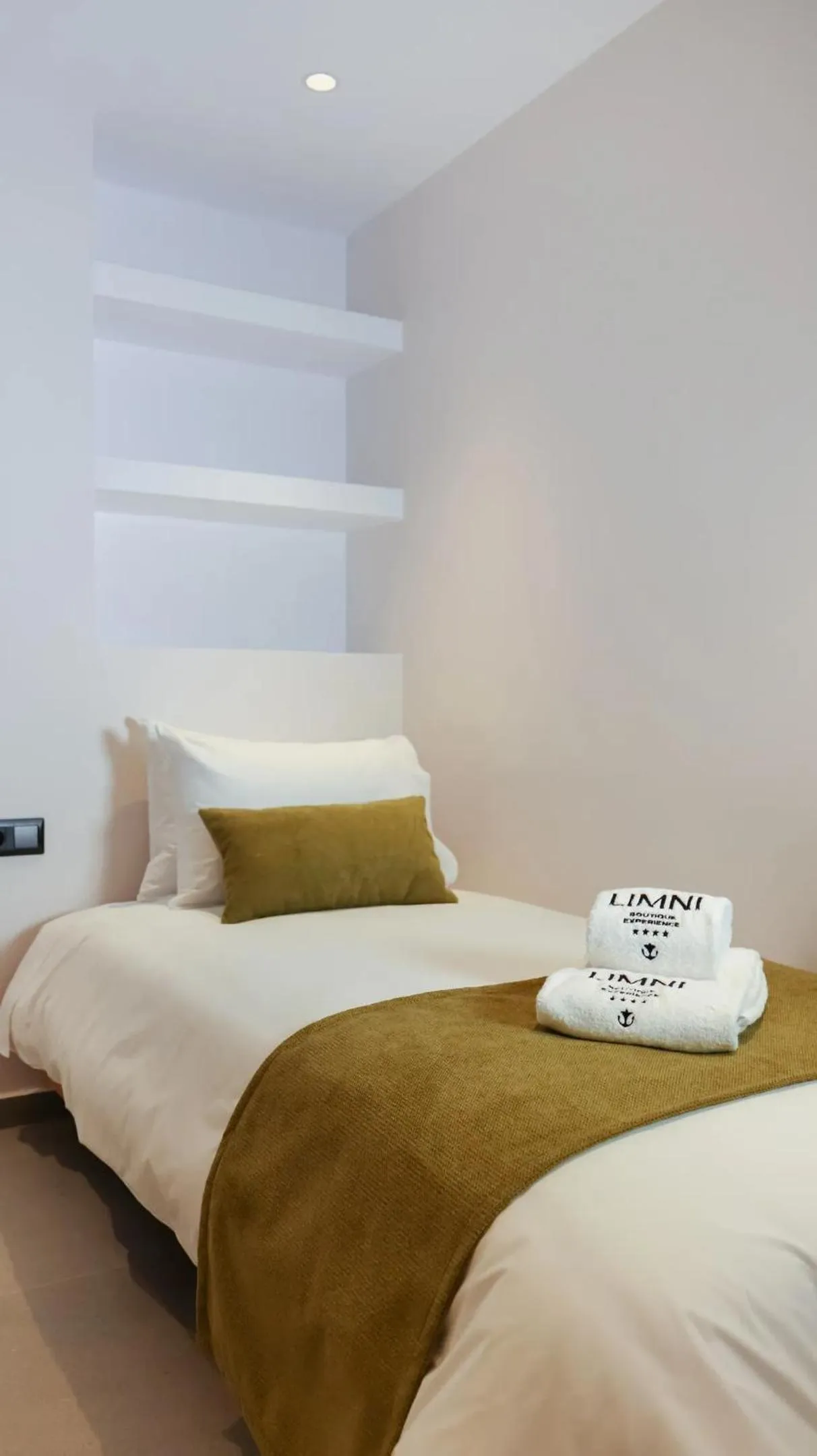 Bed in LIMNI Boutique Experience Evia