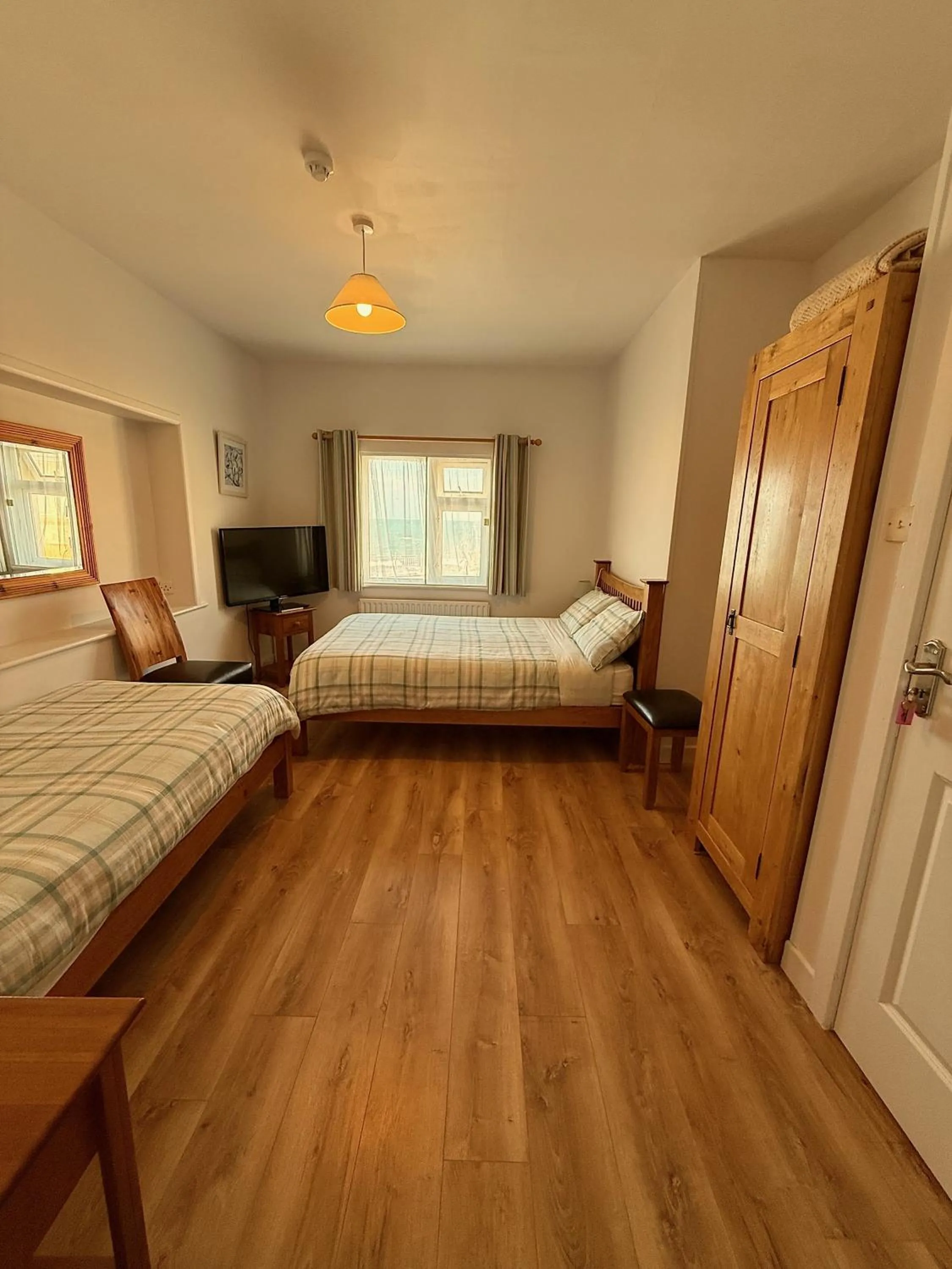 Bed in O'Neill's Bed&Breakfast