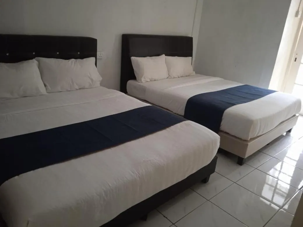 Bed in Cool view budget hotel