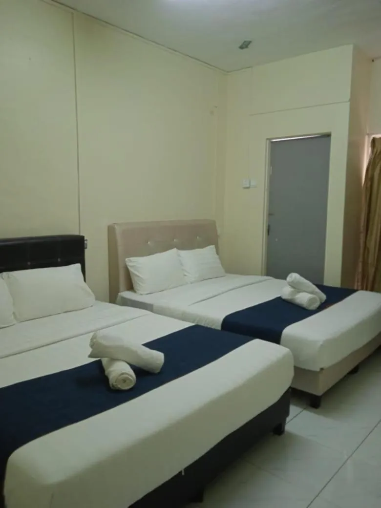 Bed in Cool view budget hotel