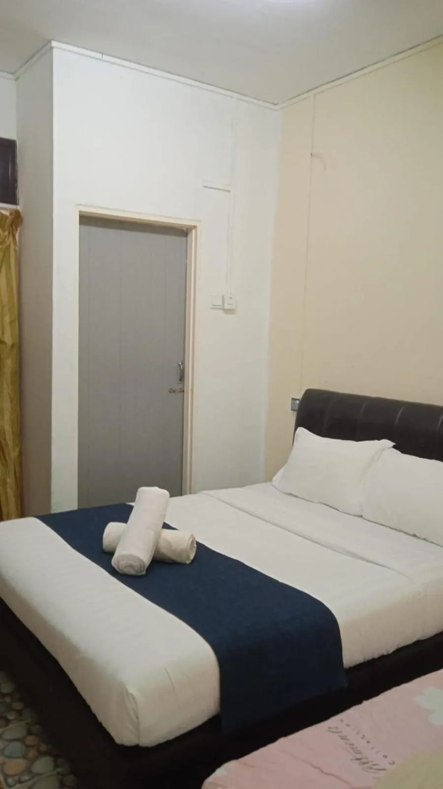 Bed in Cool view budget hotel