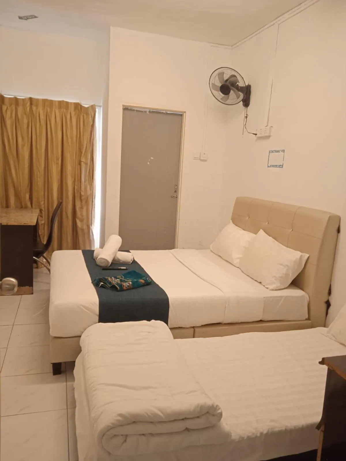 Bed in Cool view budget hotel