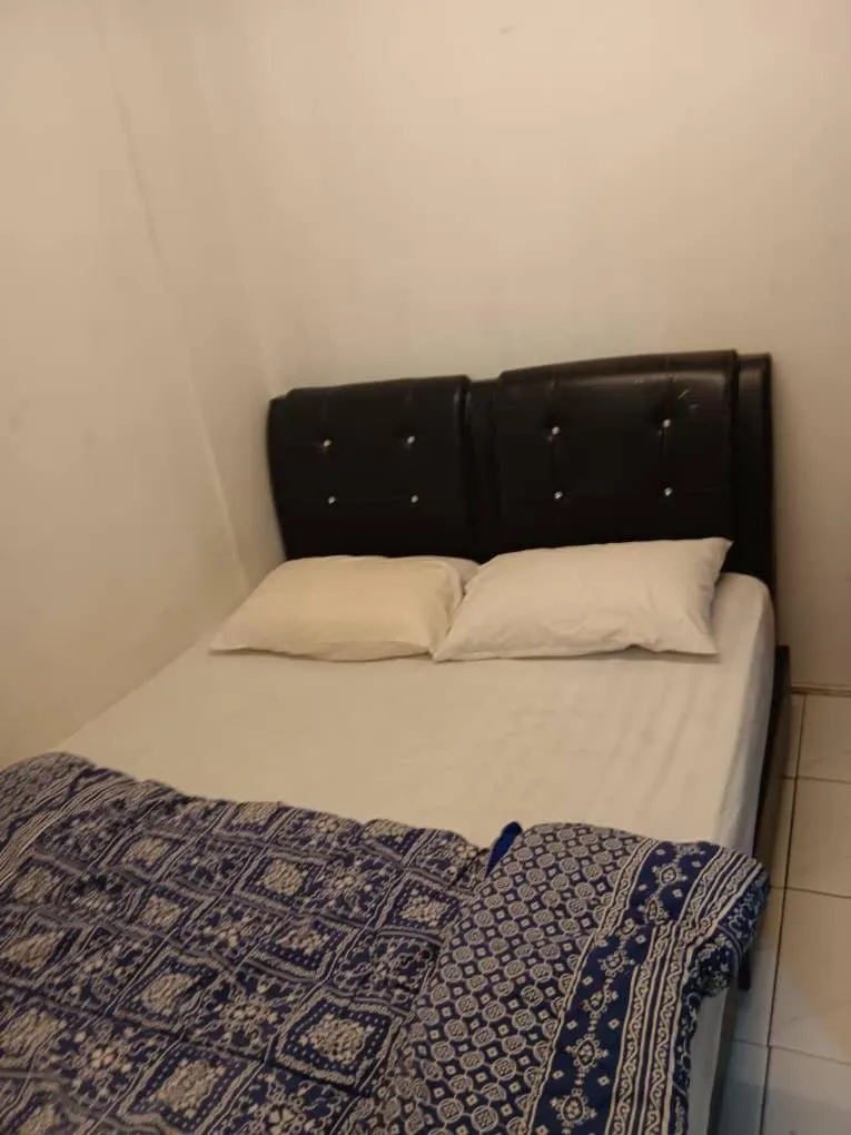 Bed in Cool view budget hotel