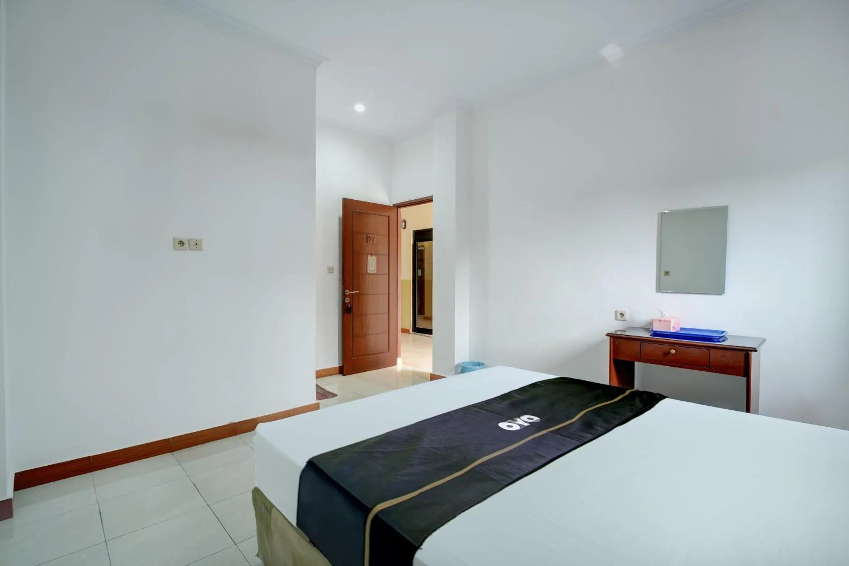 Photo of the whole room, Bed in Hotel O Depok near Bhayangkara BRIMOB Hospital Formerly Hotel Mutiara Kelapa Dua Depok