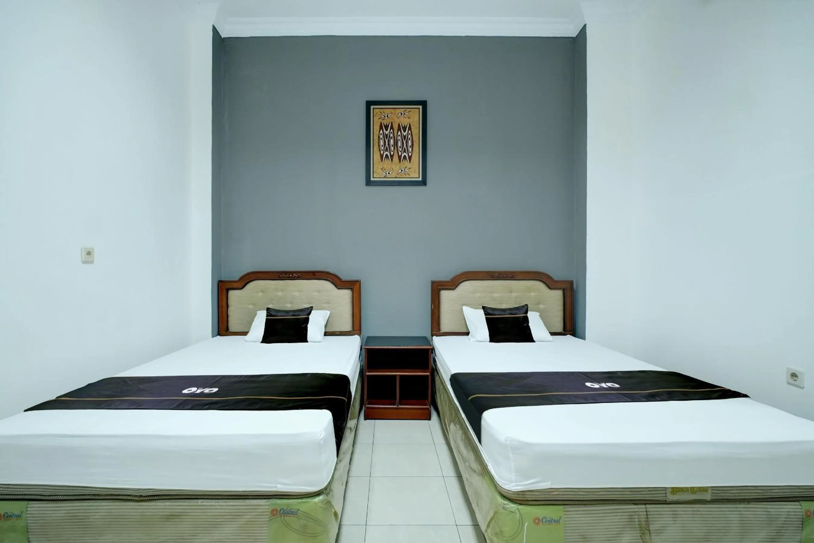 Photo of the whole room, Bed in Hotel O Depok near Bhayangkara BRIMOB Hospital Formerly Hotel Mutiara Kelapa Dua Depok