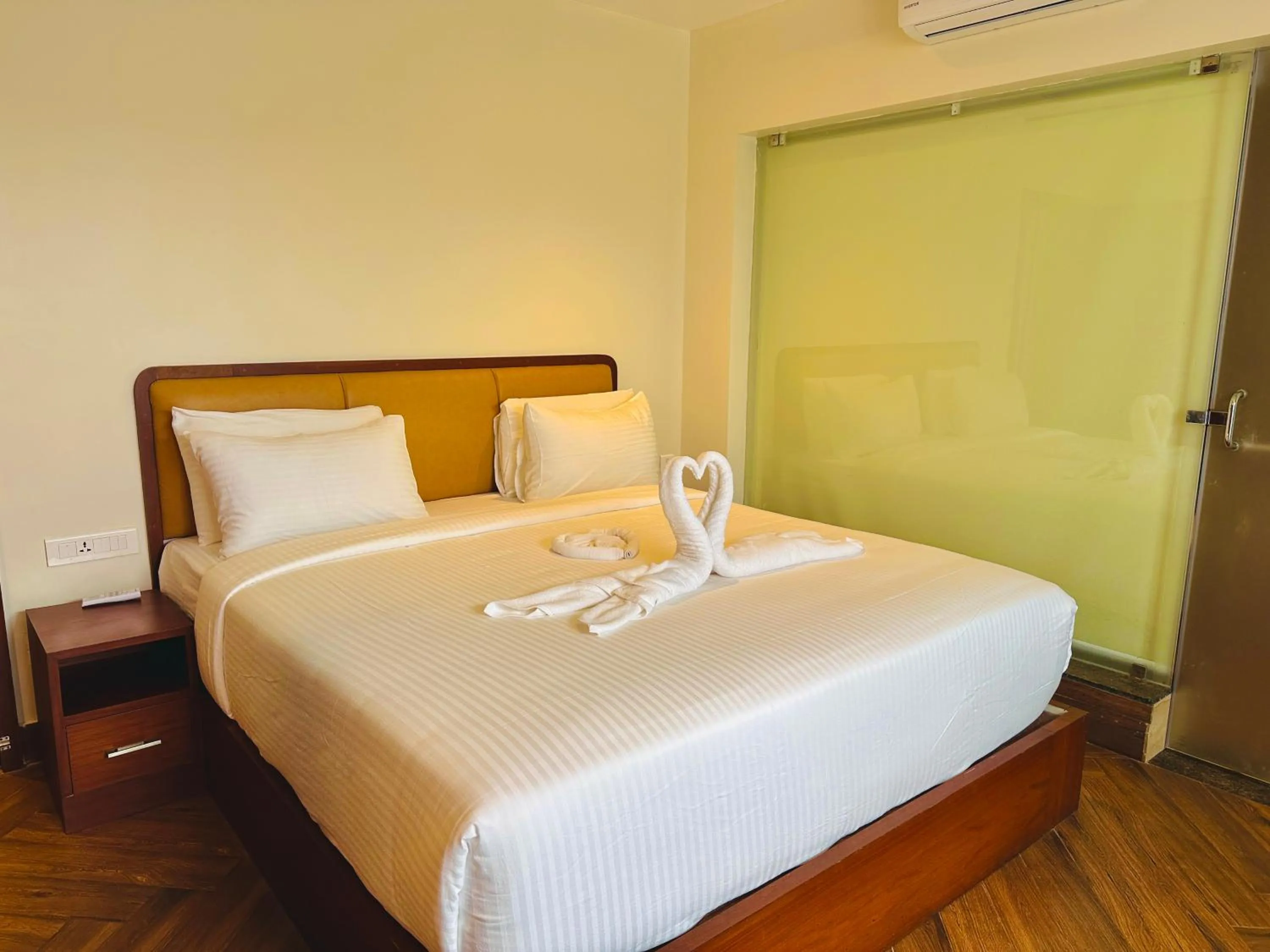 Bed in Talenresort Vythiri Villas