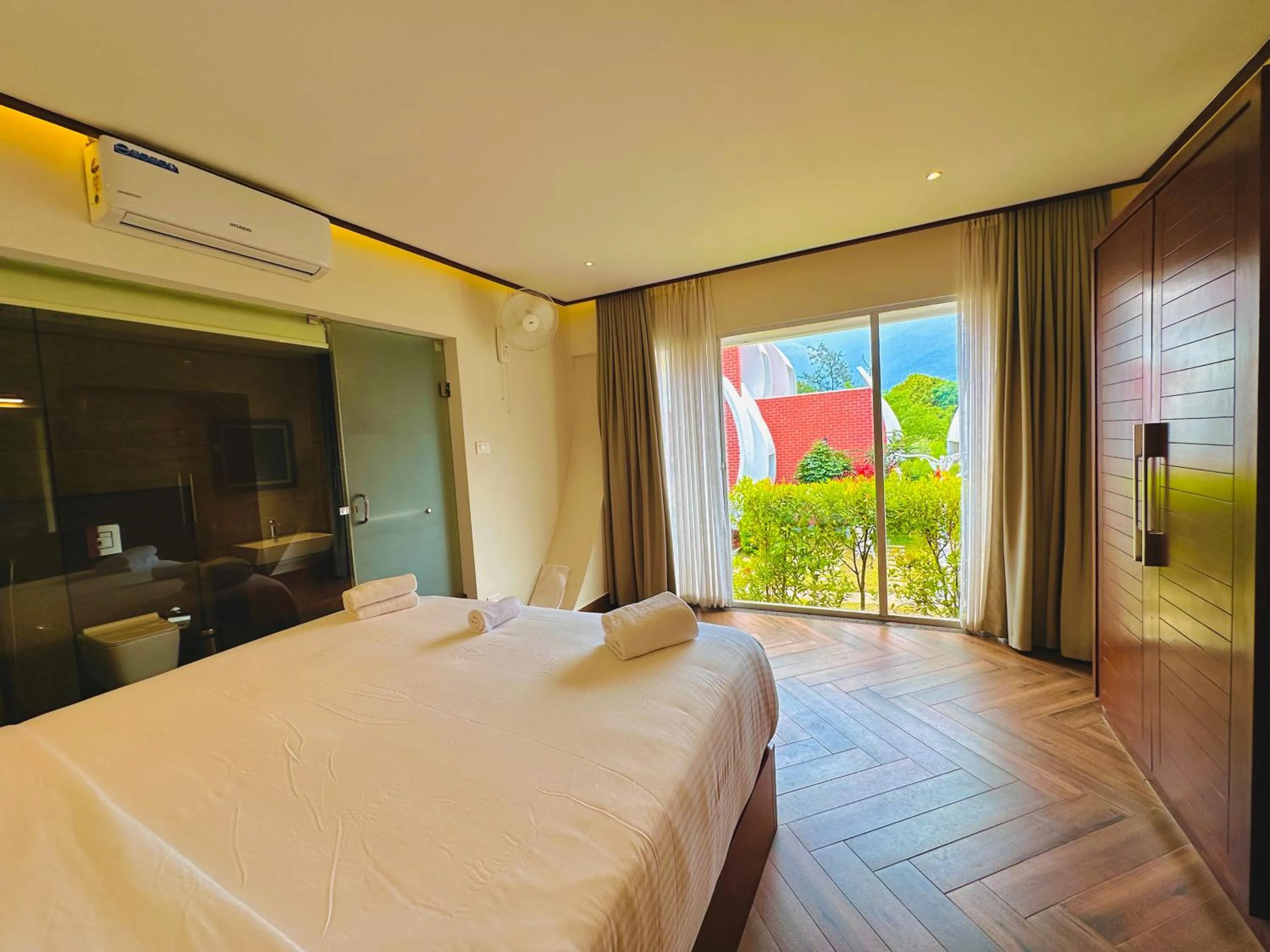 Bed in Talenresort Vythiri Villas