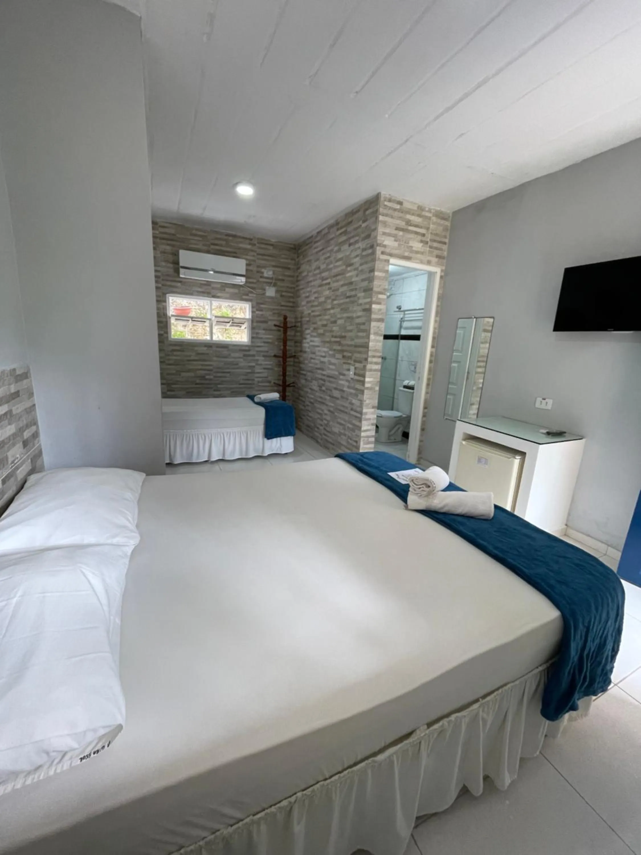 Bed in Pousada Girassol