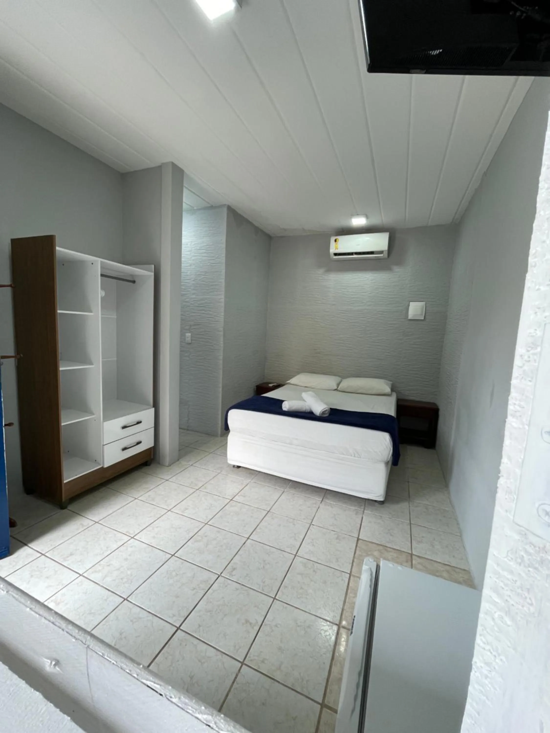 Bed in Pousada Girassol