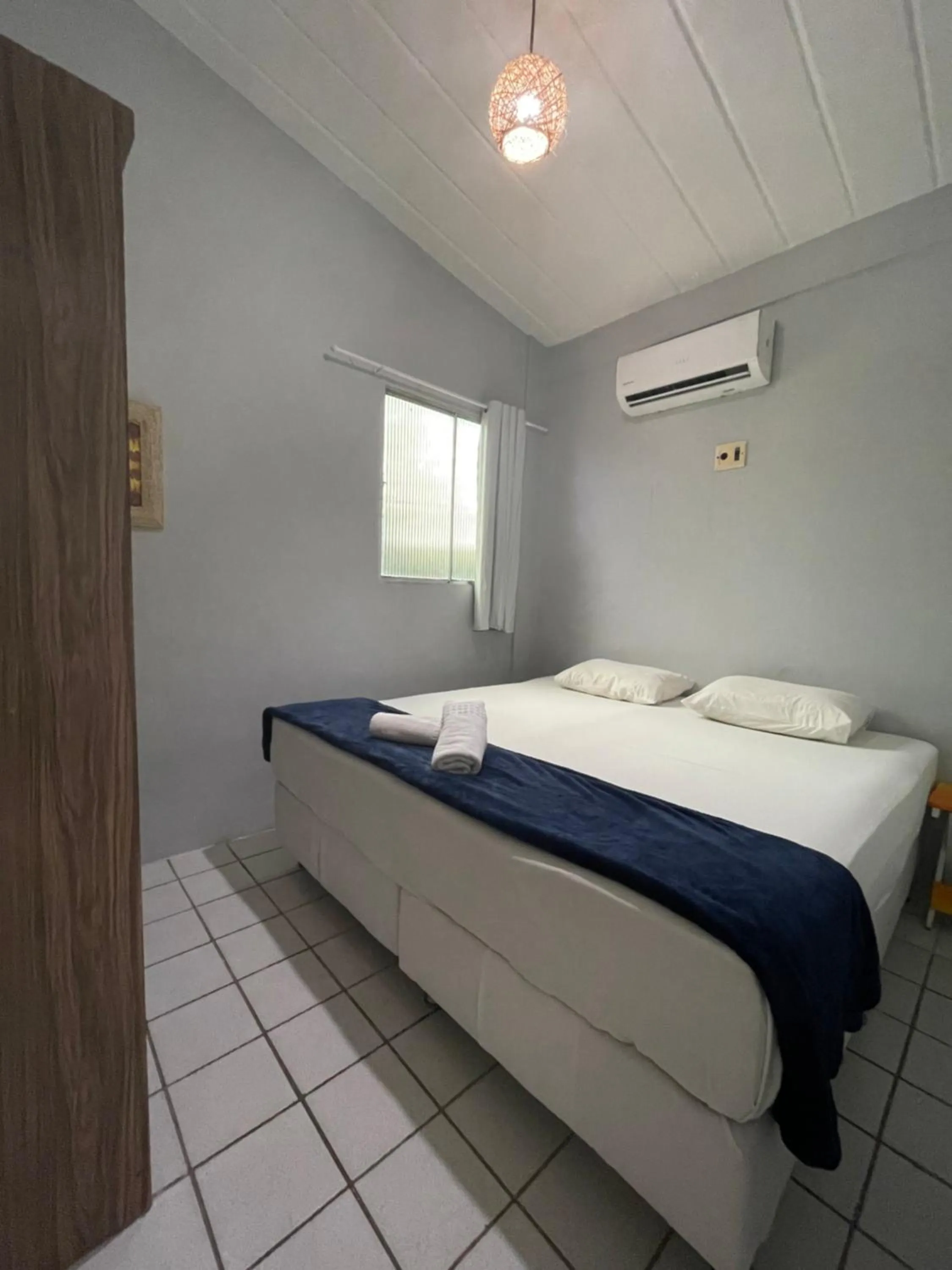 Bed in Pousada Girassol