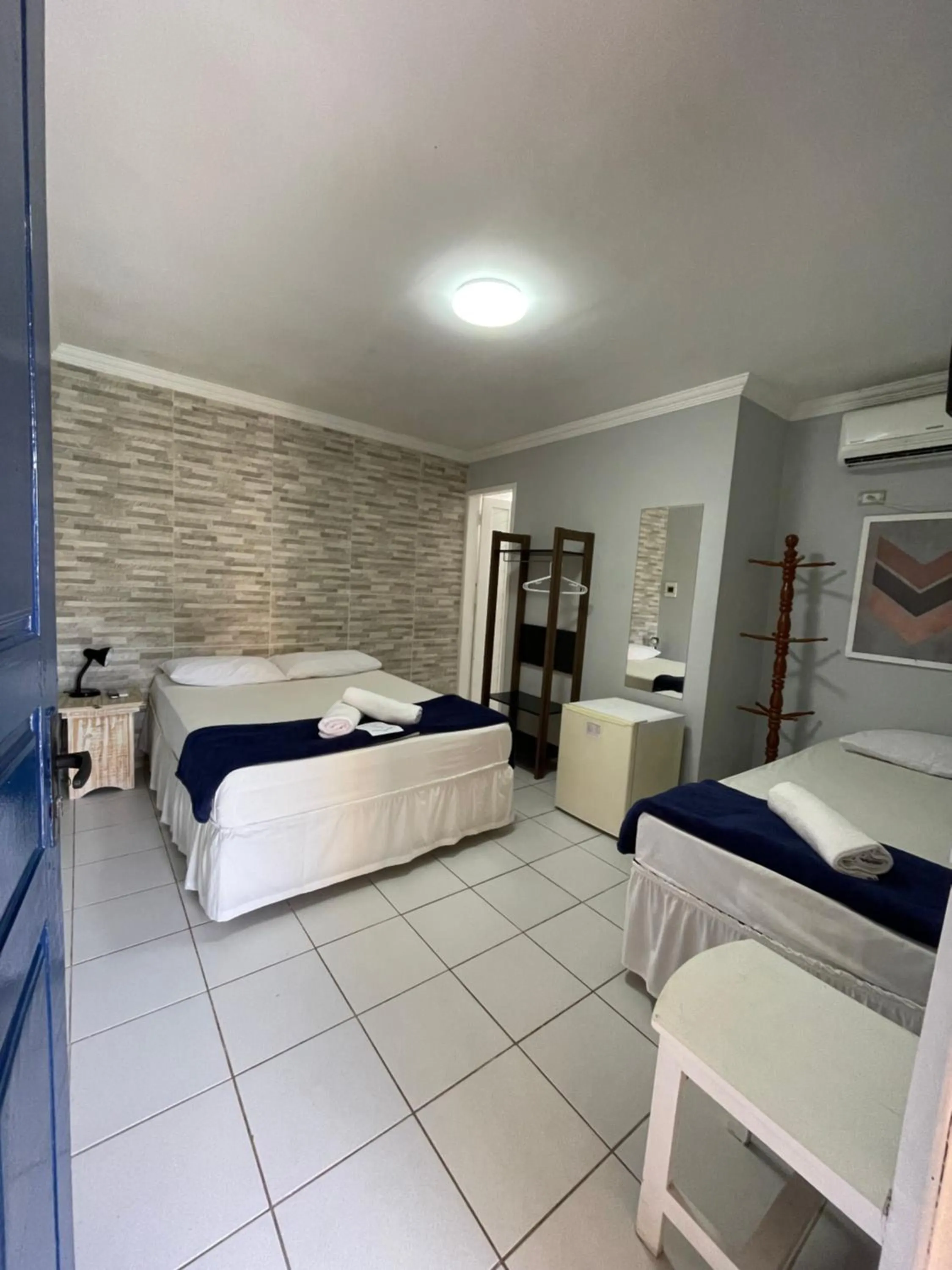 Bed in Pousada Girassol