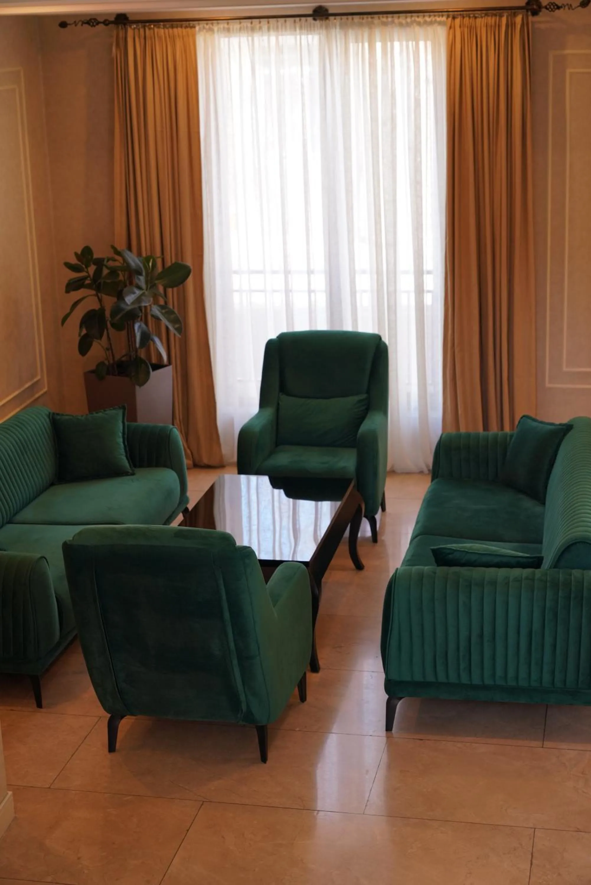 Seating area in Marionn Hotel