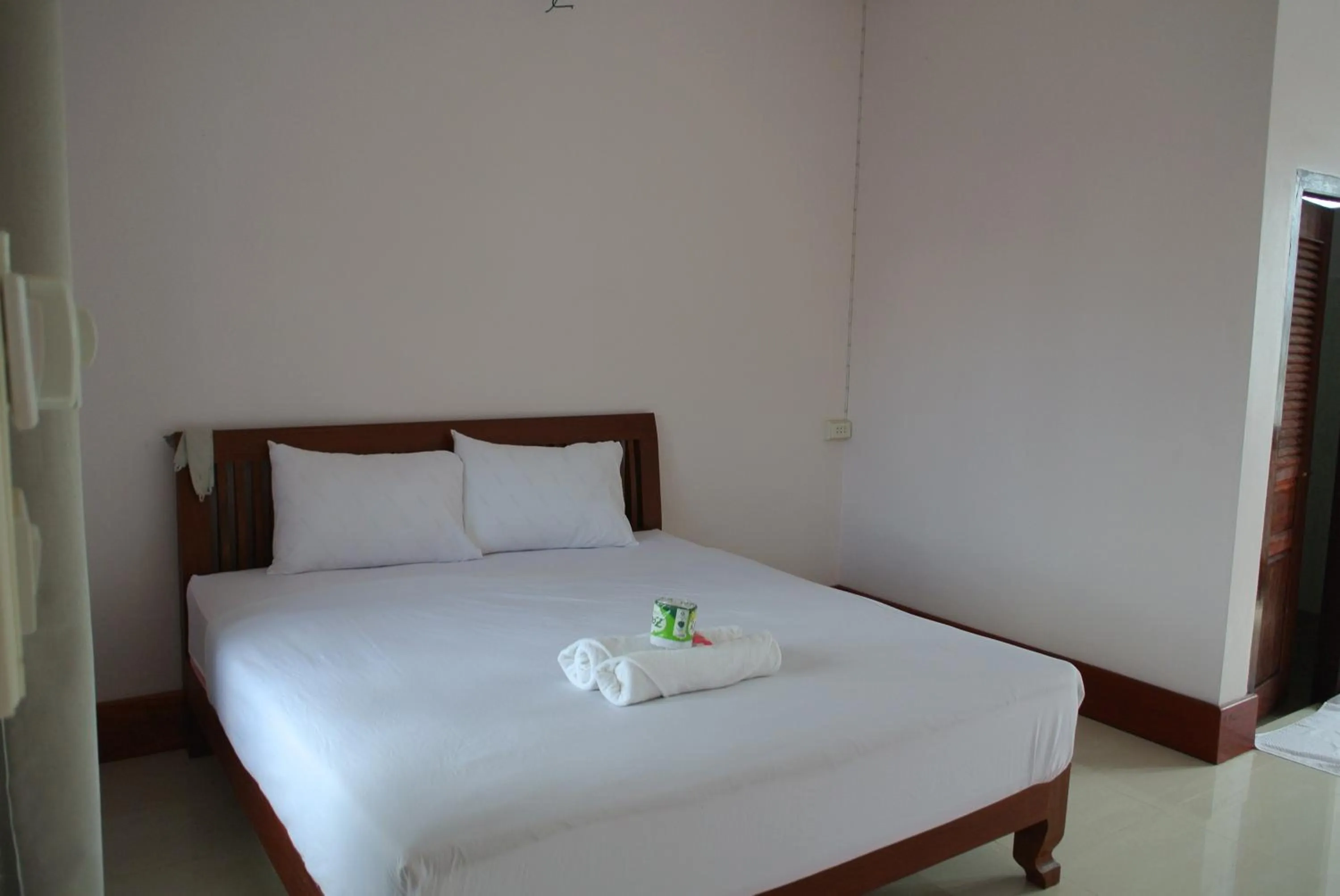 Bed in Mama Leurth Sunset Guesthouse