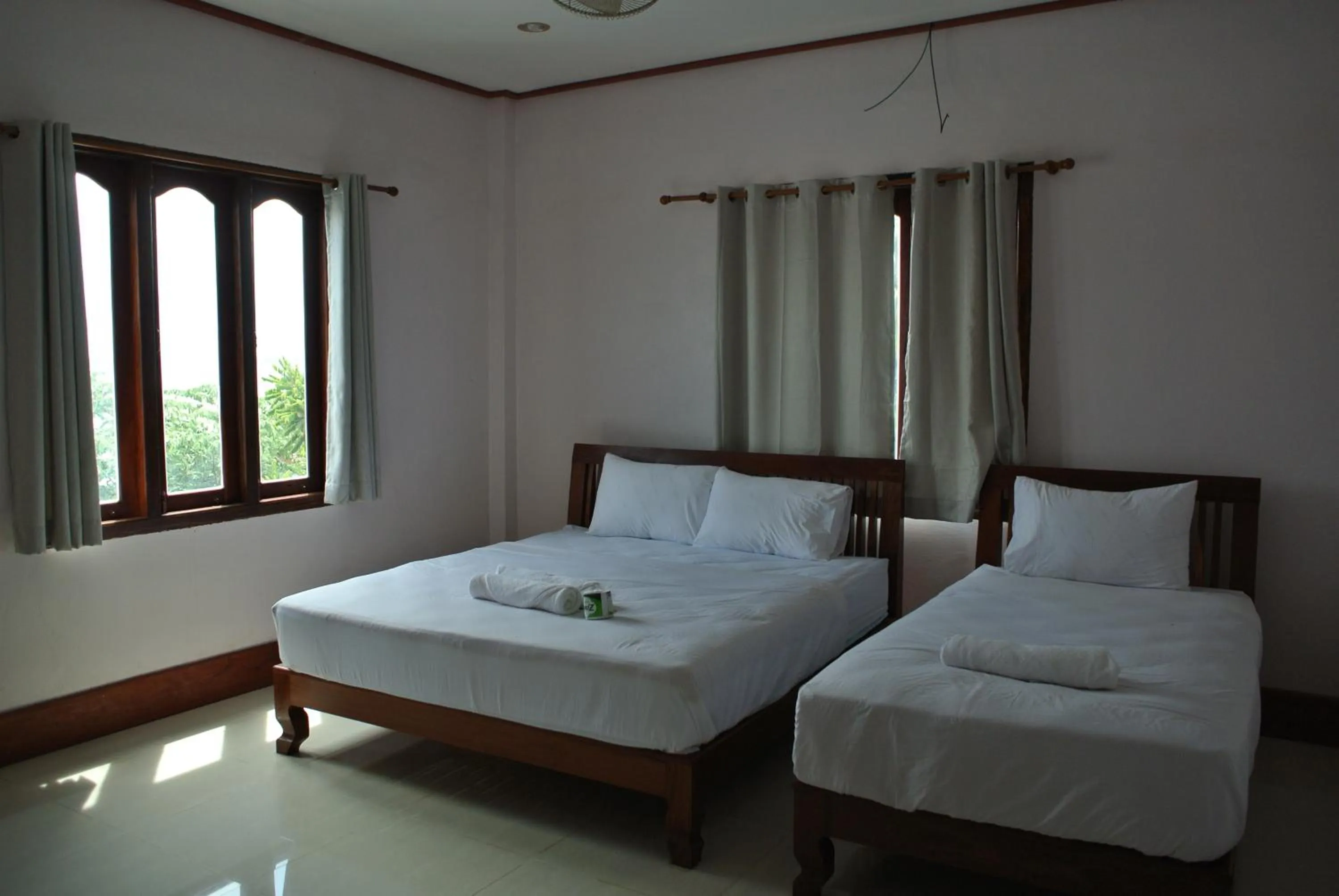 Bed in Mama Leurth Sunset Guesthouse