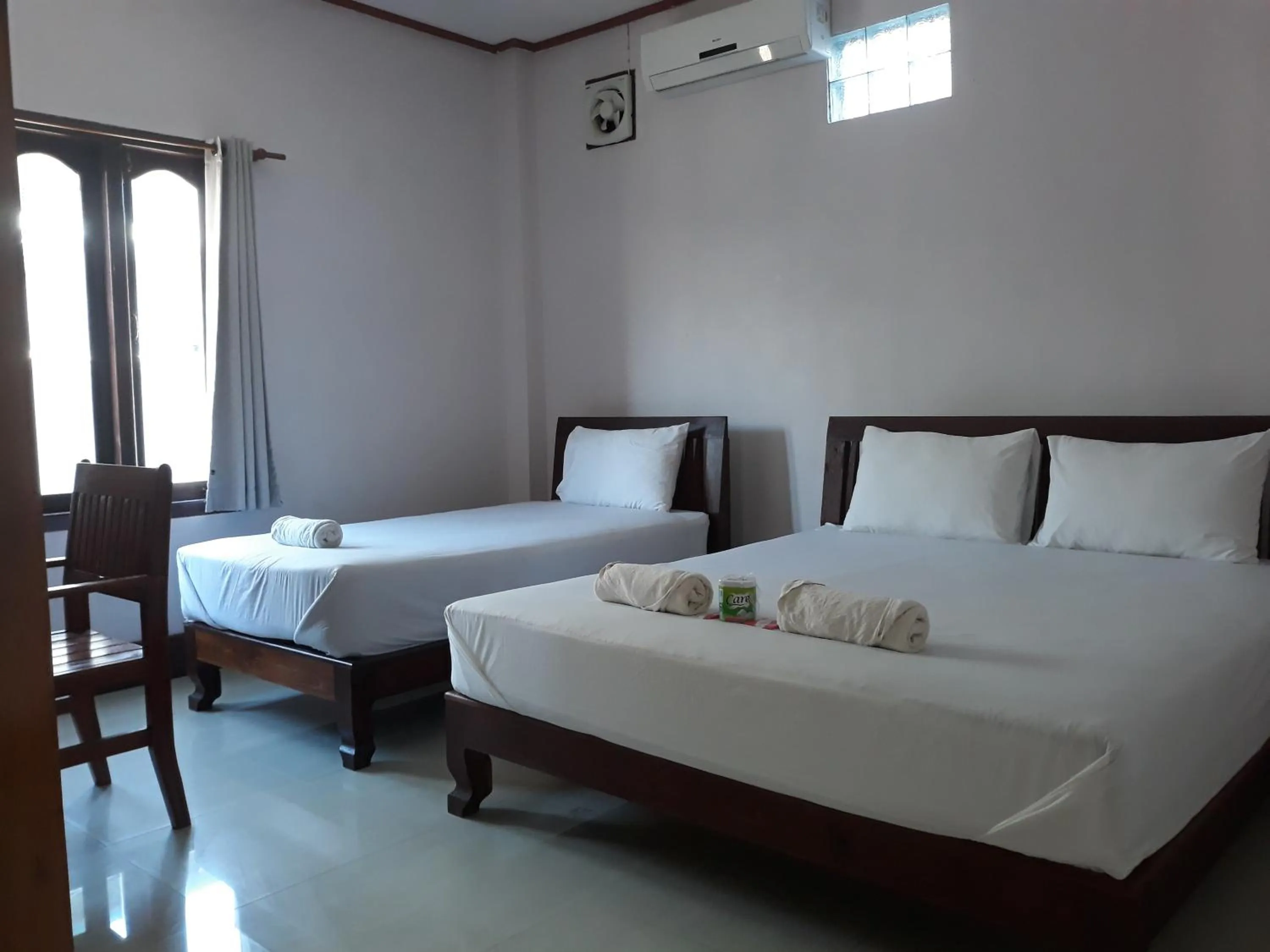 Bed in Mama Leurth Sunset Guesthouse