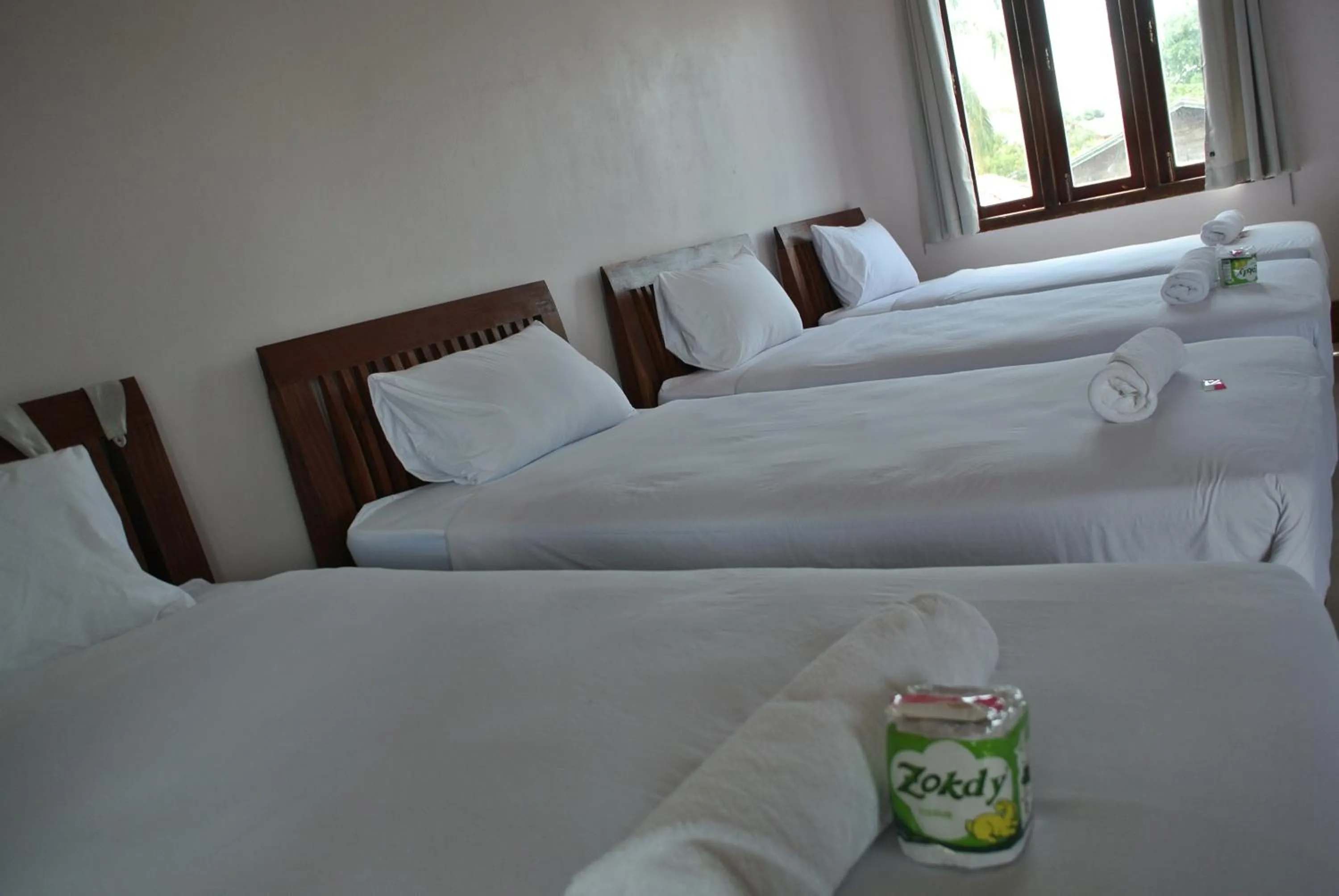 Bed in Mama Leurth Sunset Guesthouse