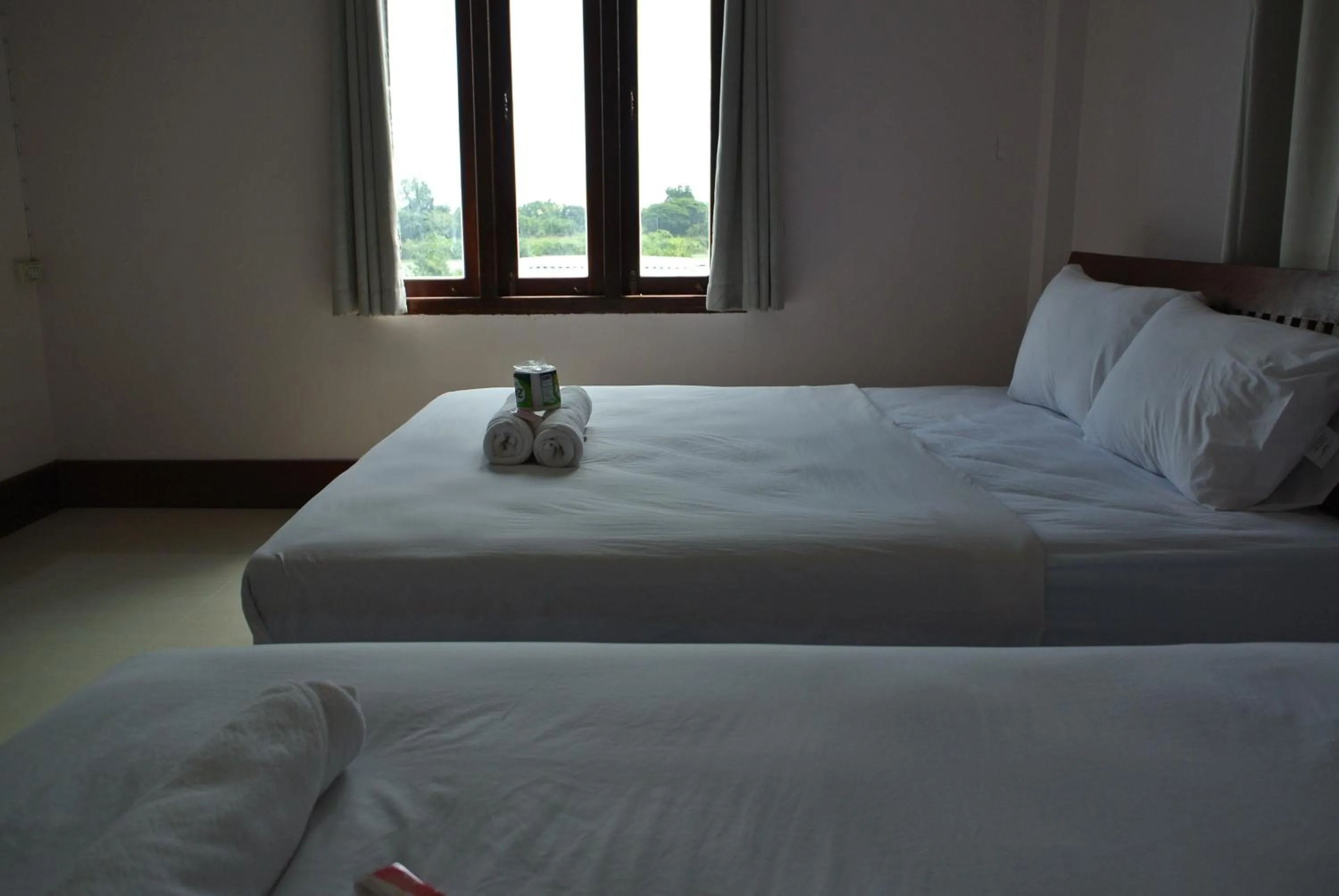 Bed in Mama Leurth Sunset Guesthouse