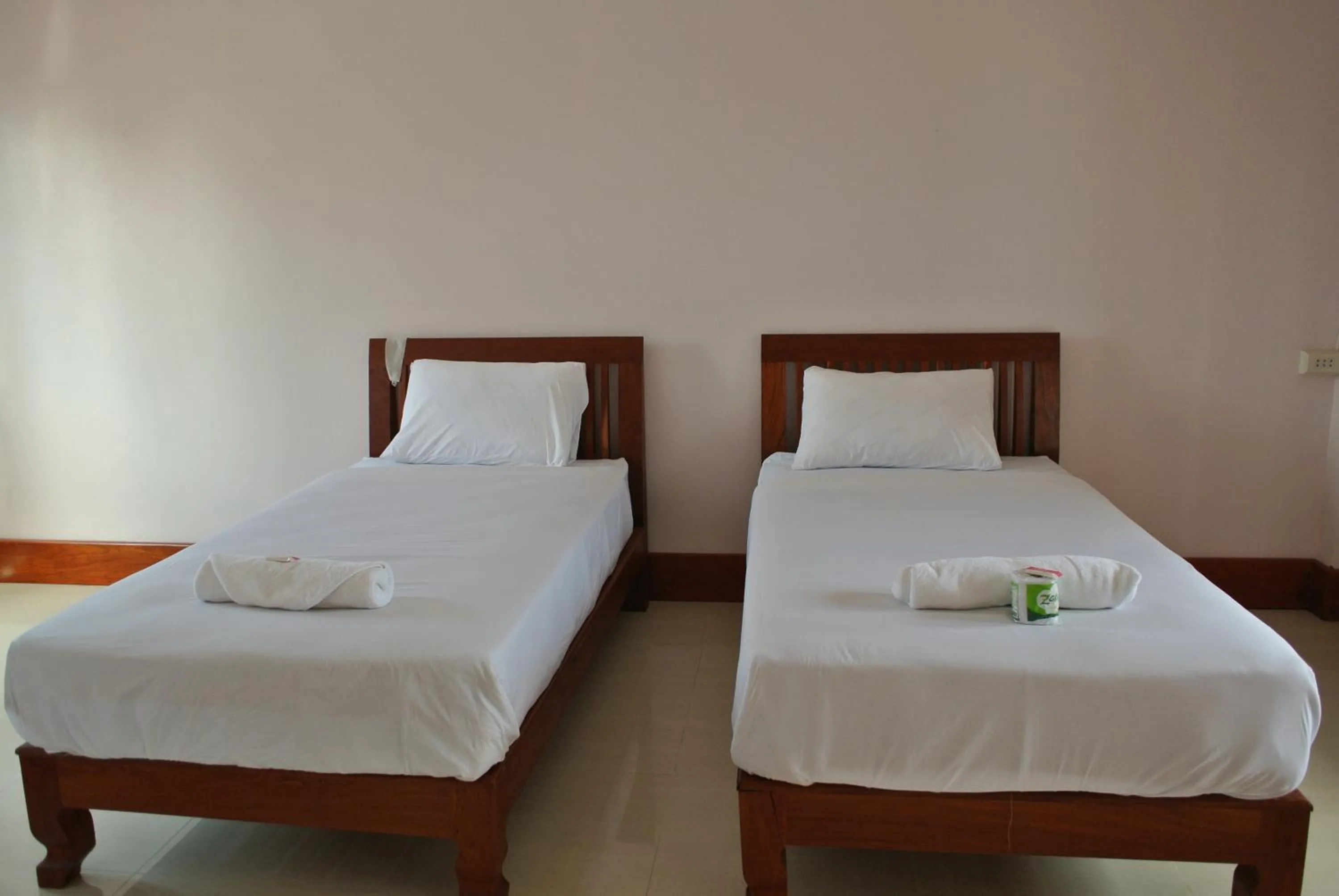 Bed in Mama Leurth Sunset Guesthouse