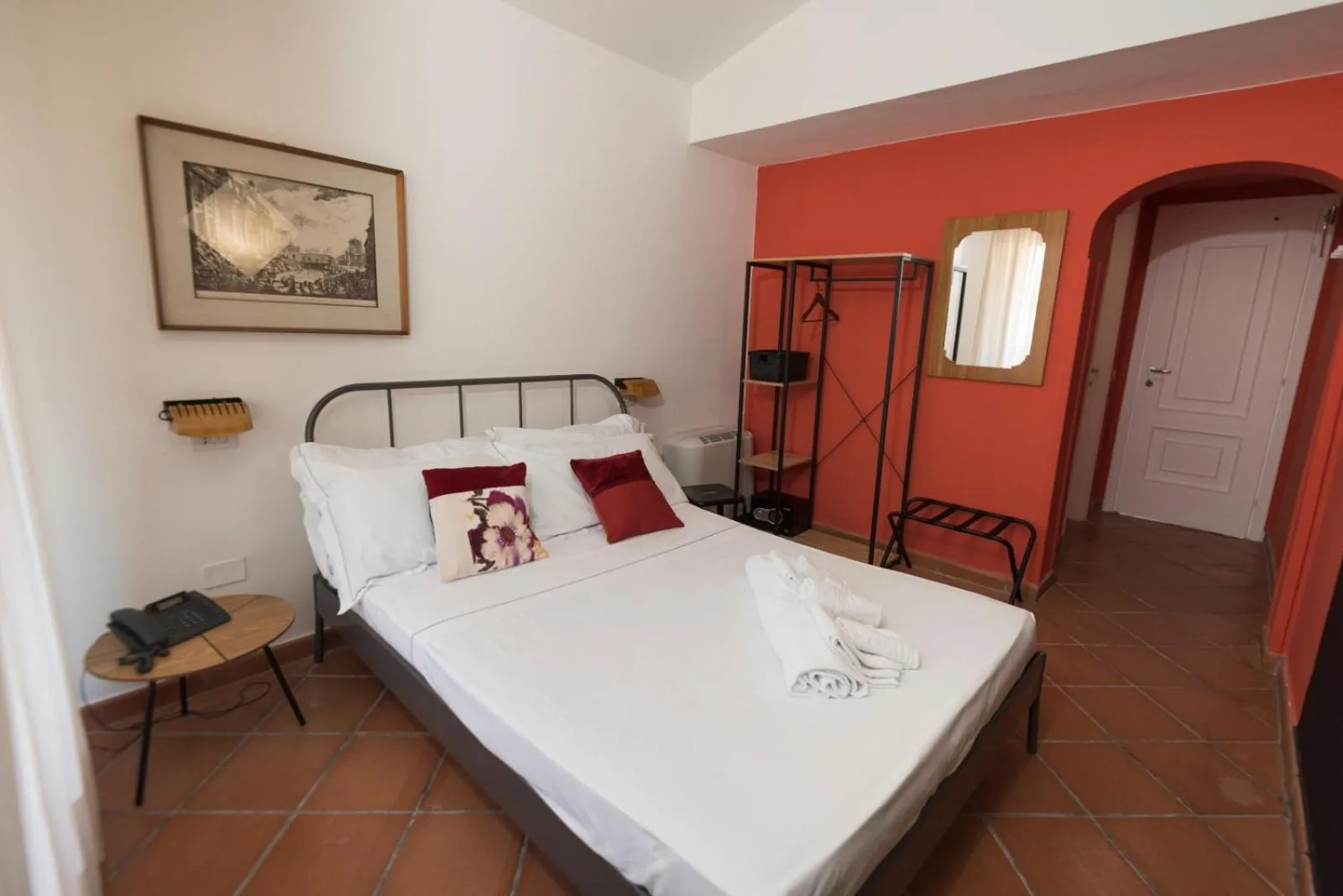 Bed in Mami Sabaudia Hotel