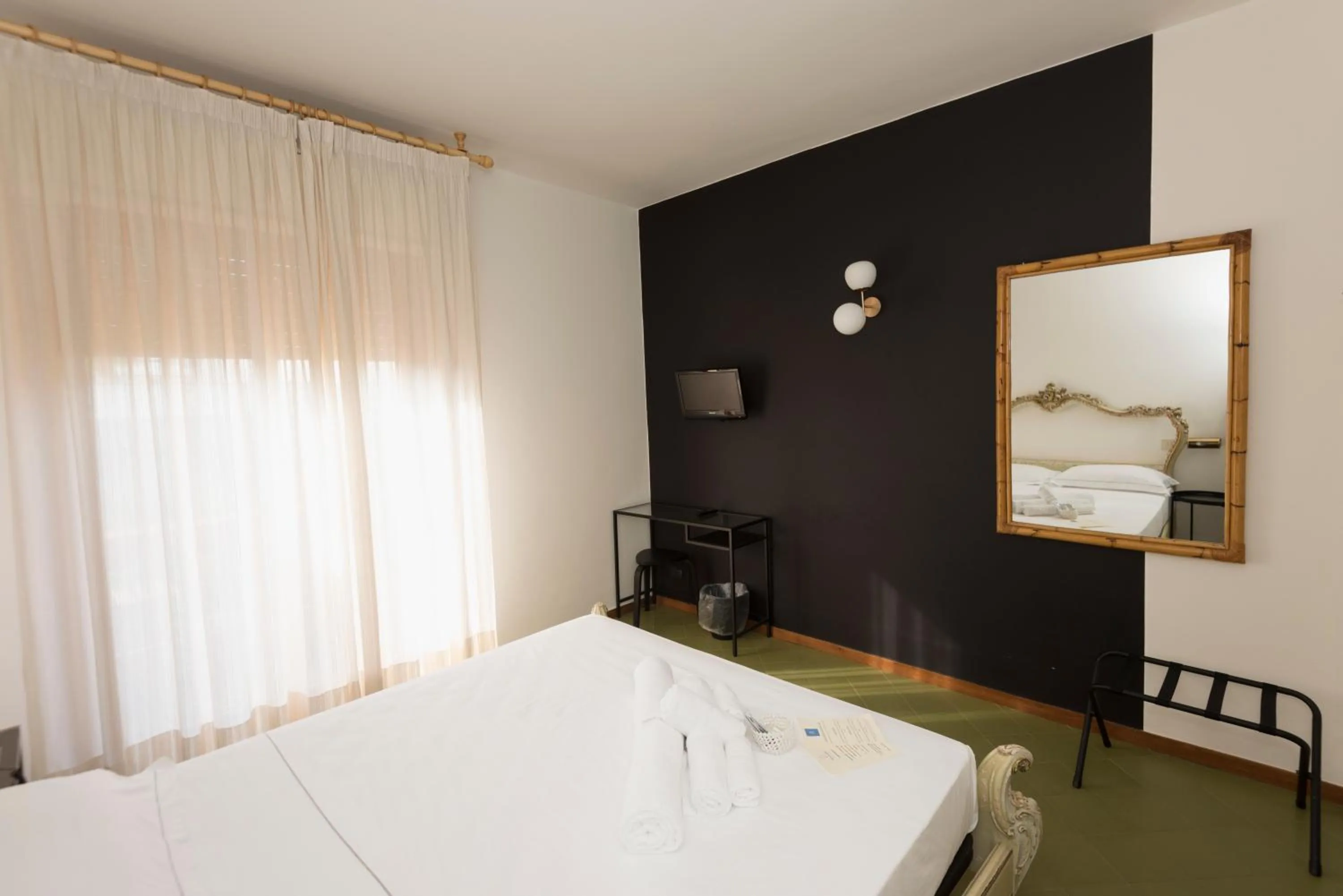 Bedroom in Mami Sabaudia Hotel