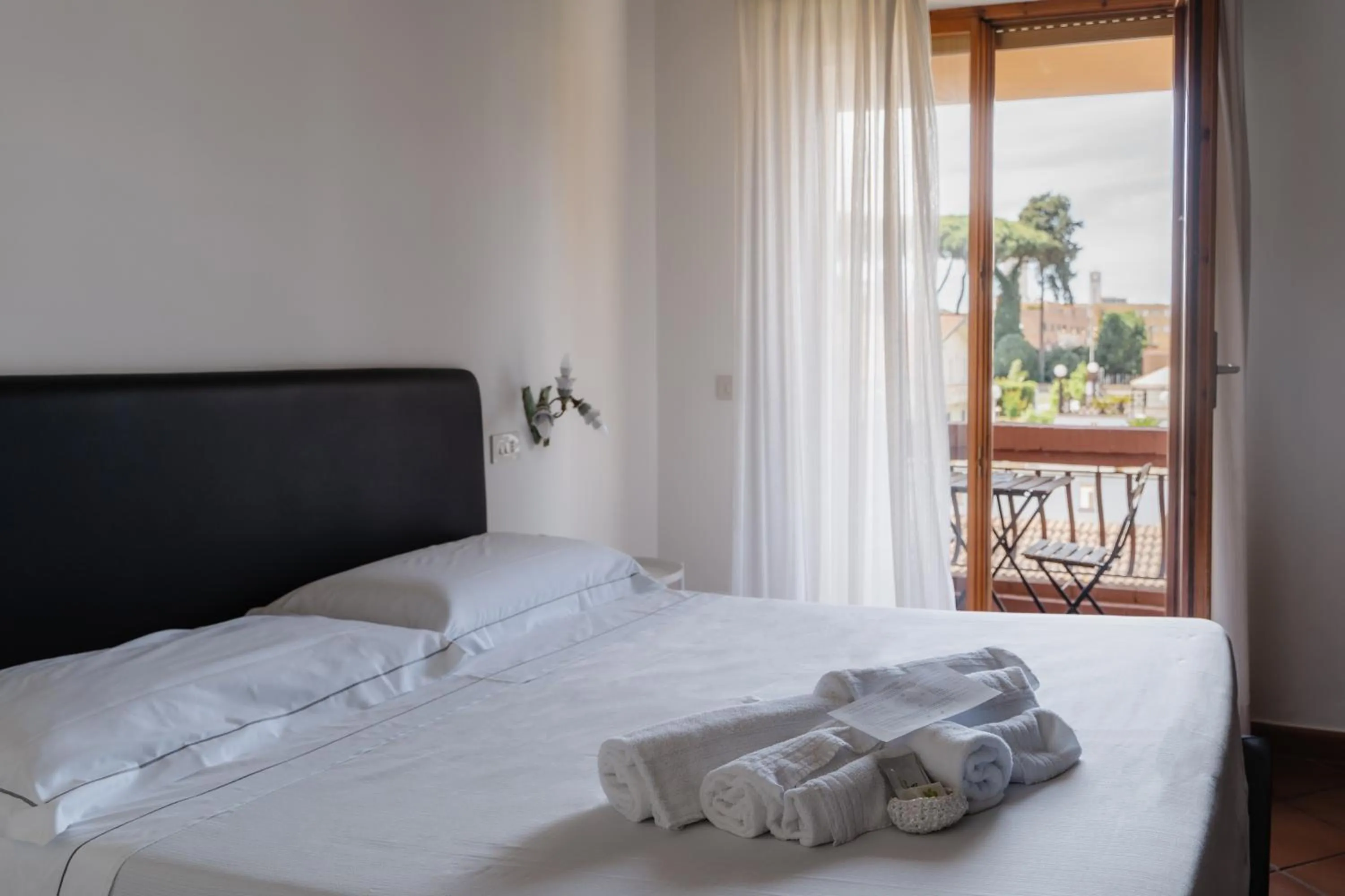 Bed in Mami Sabaudia Hotel