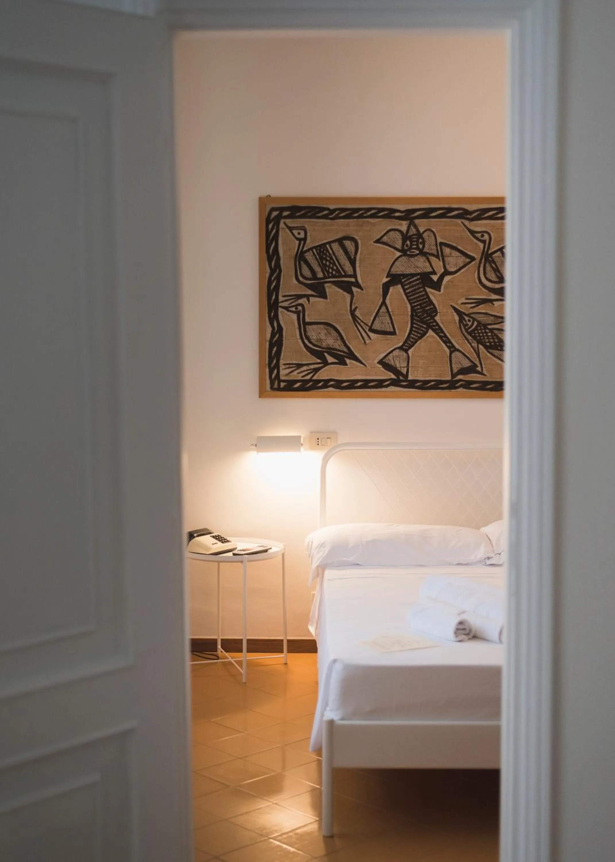 Bed in Mami Sabaudia Hotel