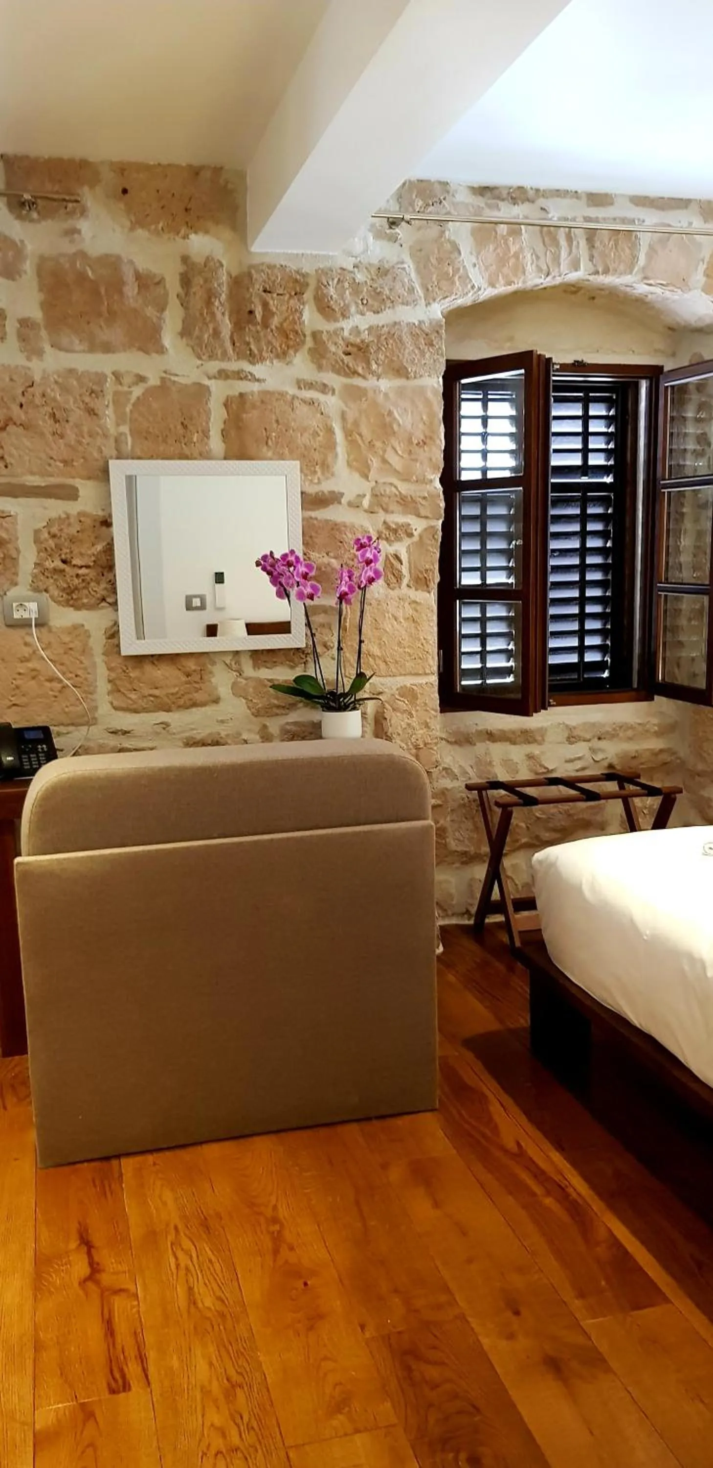 Seating area, Bed in San Teodoro