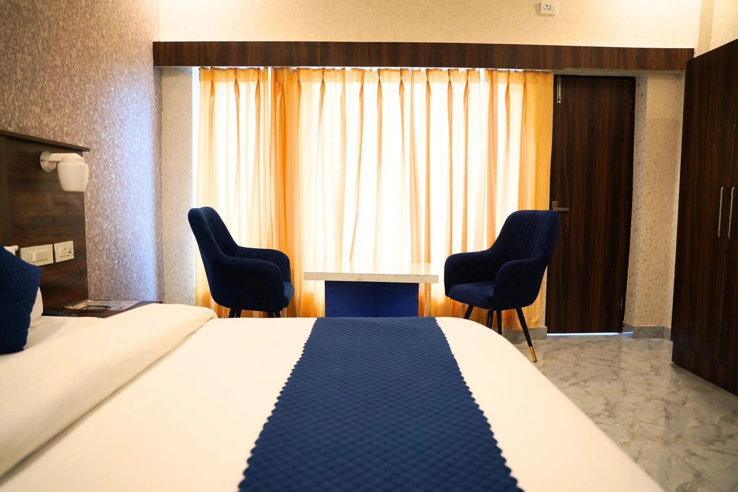 Bedroom in Hotel HSR Residency