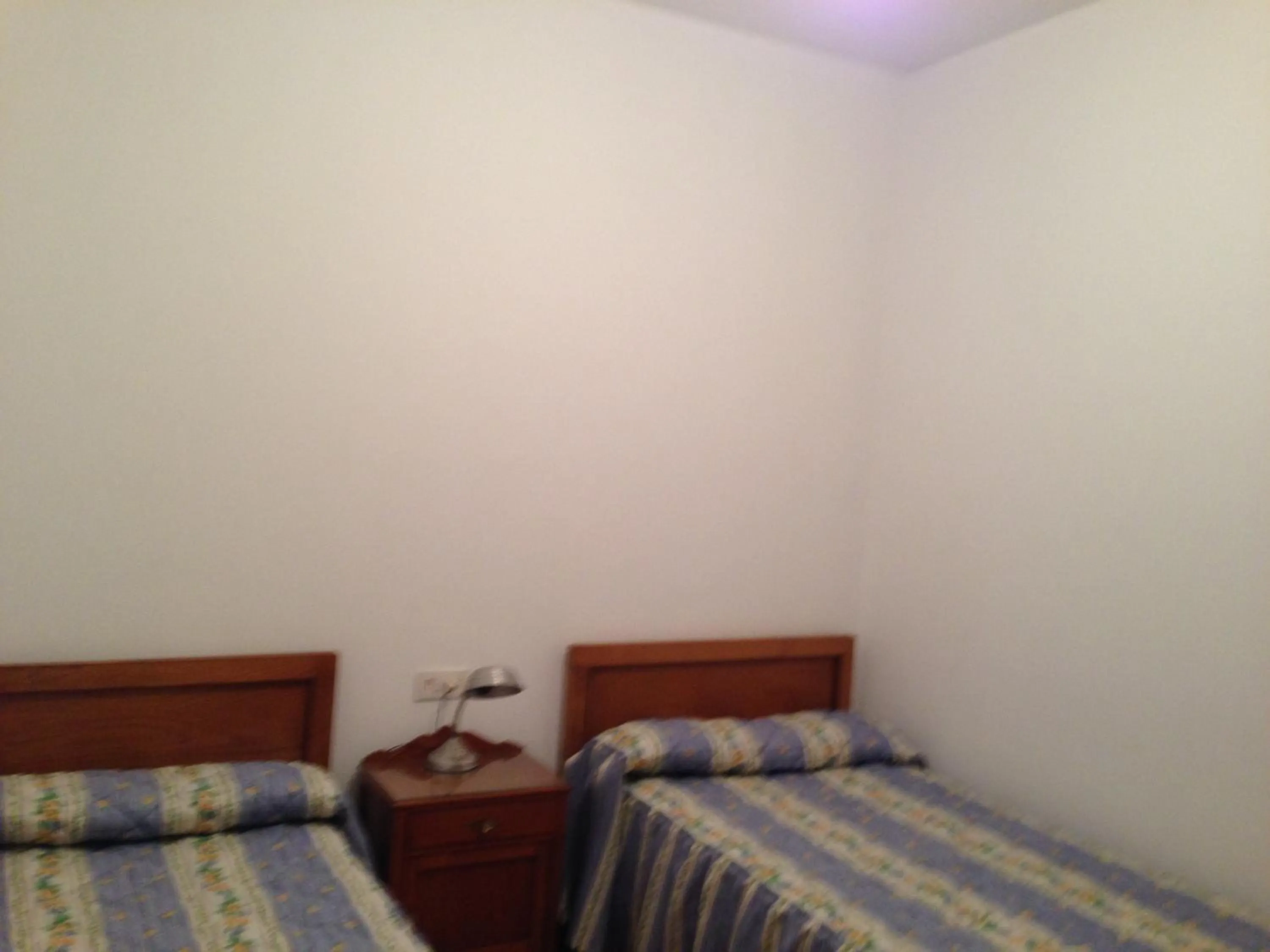 Photo of the whole room, Bed in Hostal Costa Azul