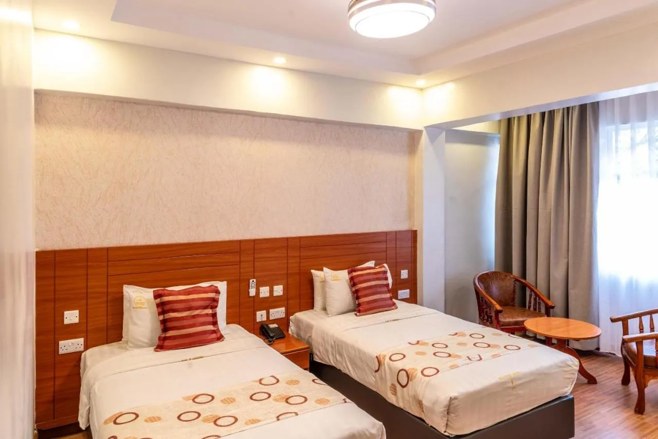 Seating area, Bed in Hillcourt Resort and Spa