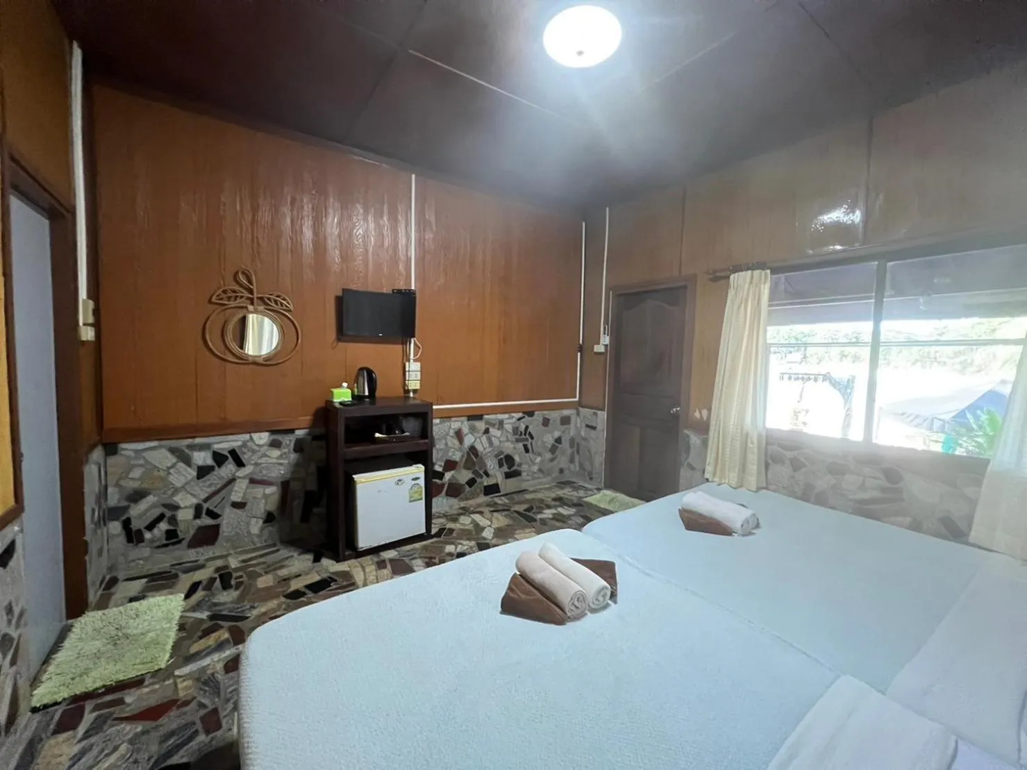 Photo of the whole room, Bed in Tongta Phaview Resort