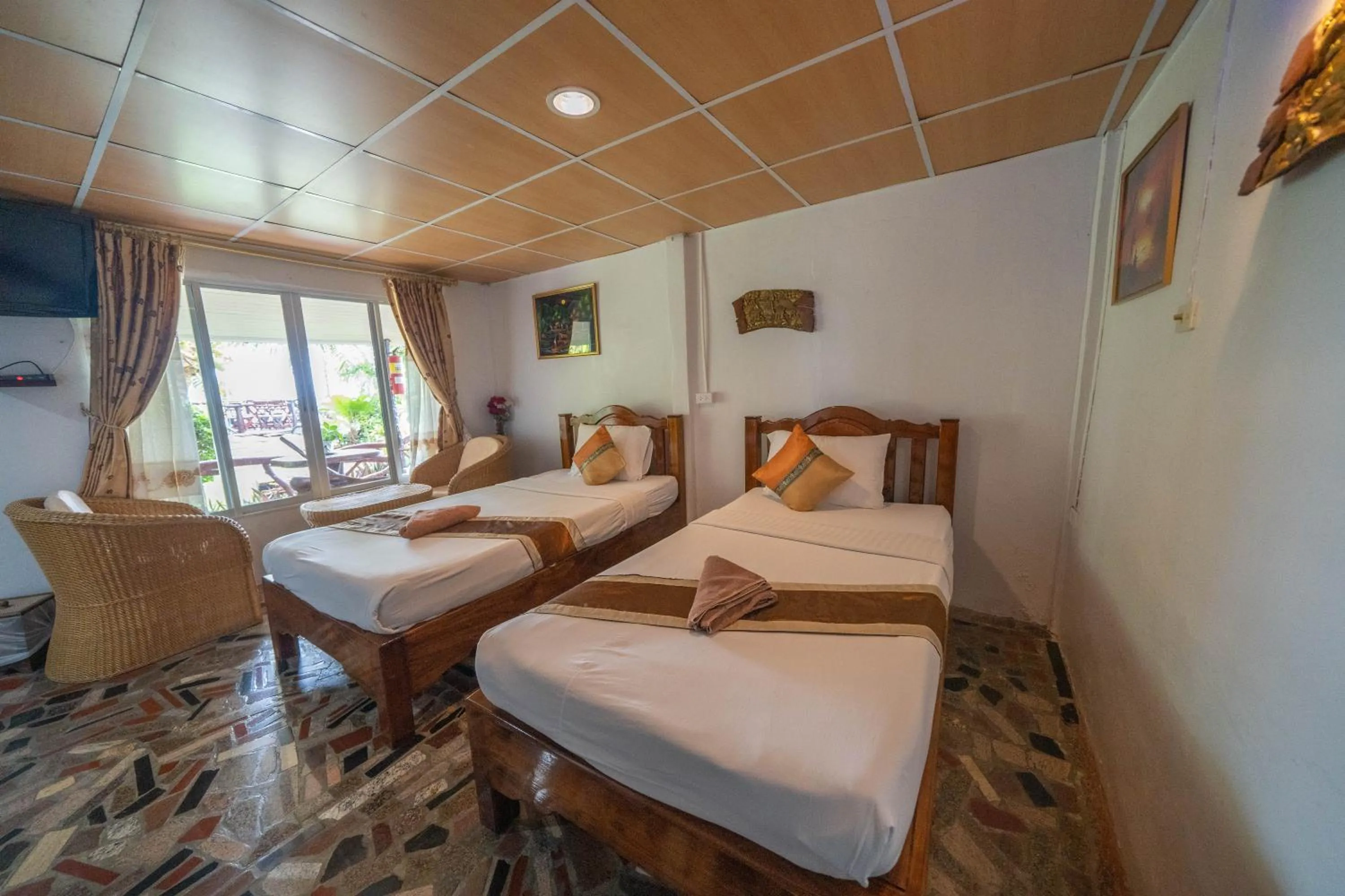 Bed in Tongta Phaview Resort