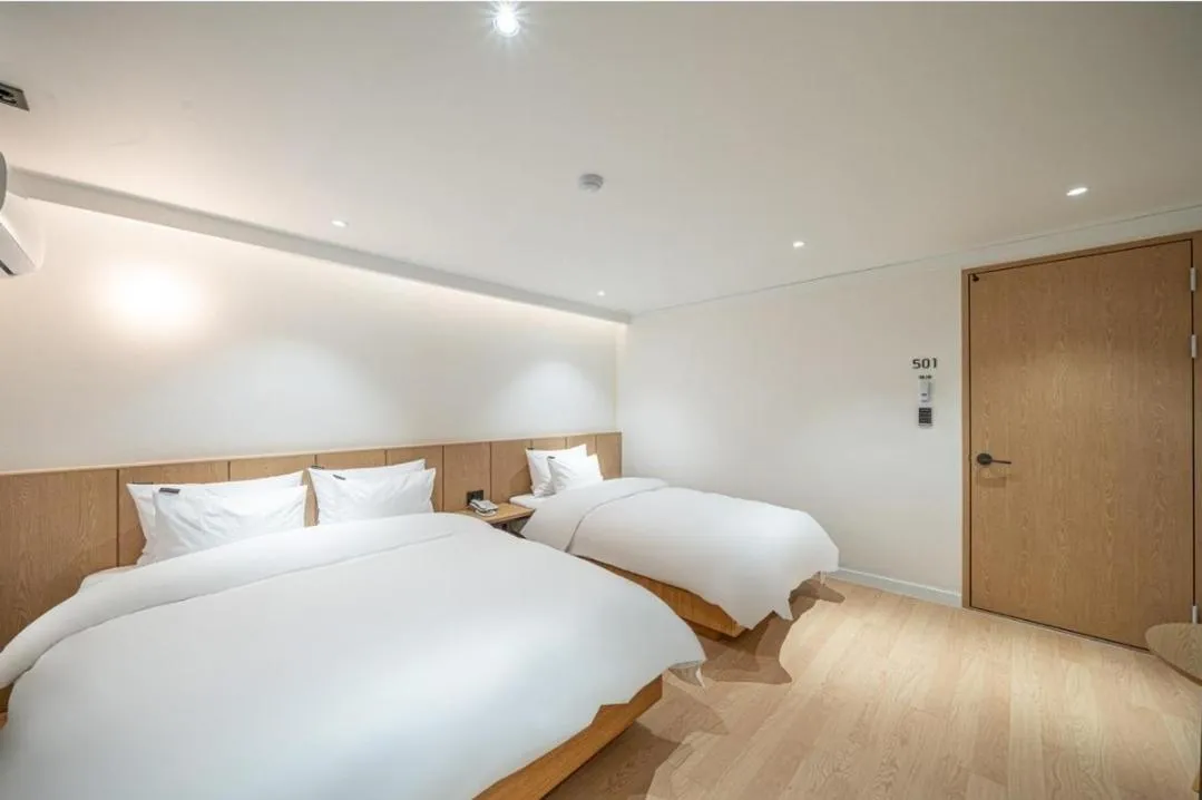 Bed in Brown Dot Hotel South Gumi