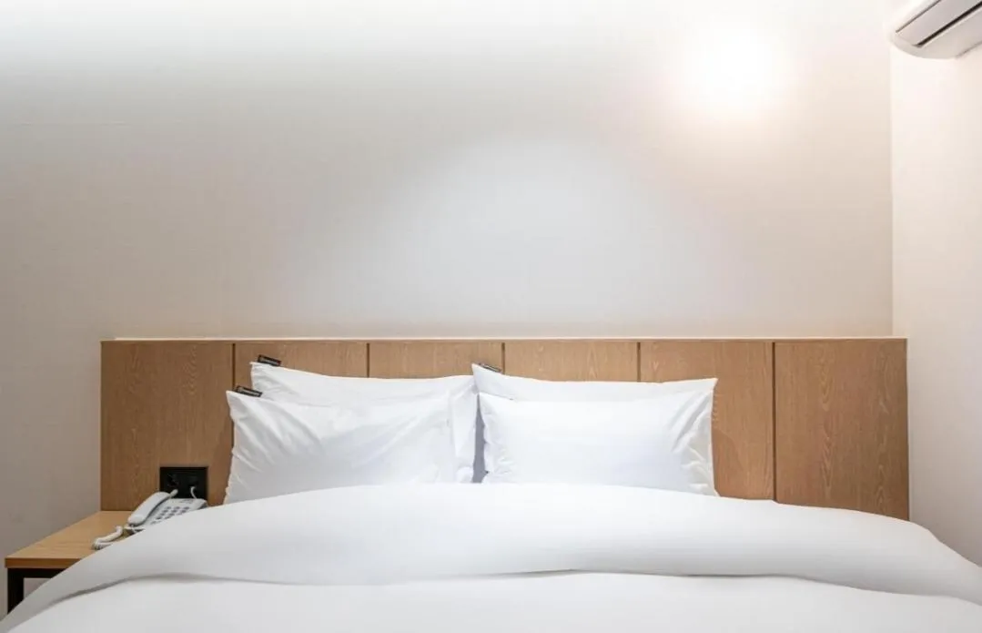 Bed in Brown Dot Hotel South Gumi