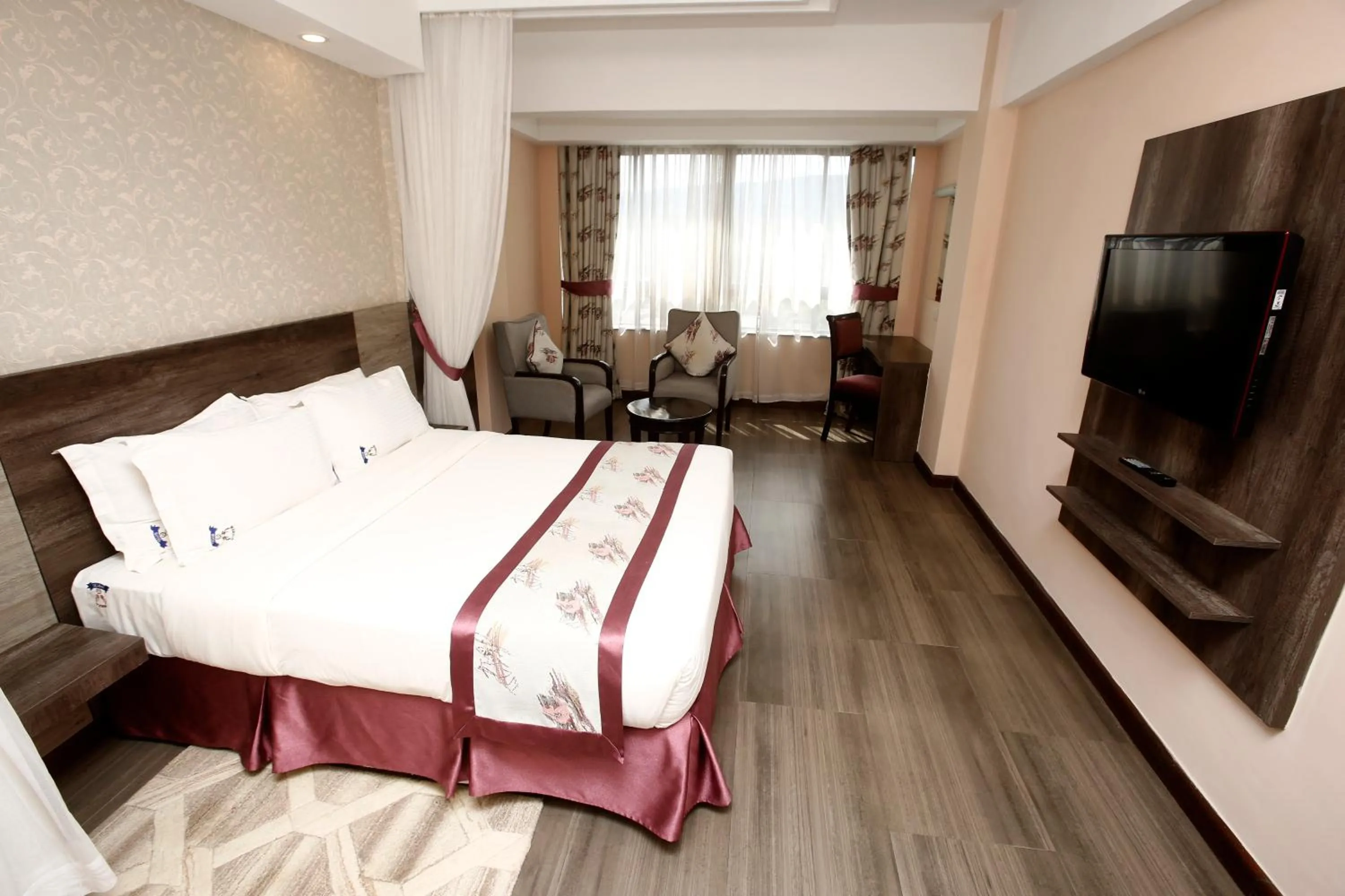 Photo of the whole room, Bed in Merica Hotel