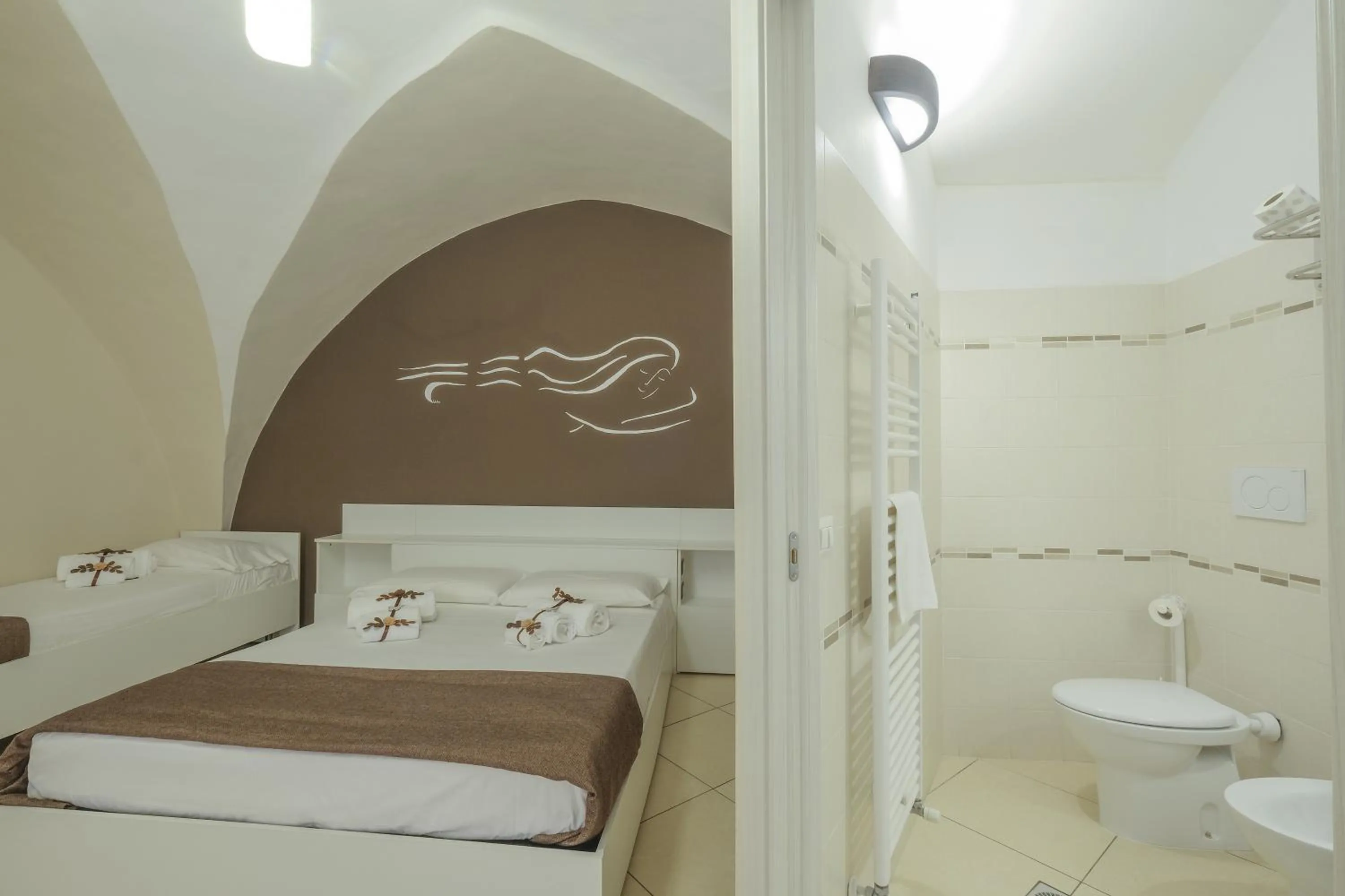 Bed in Le Suite del Dormiglione