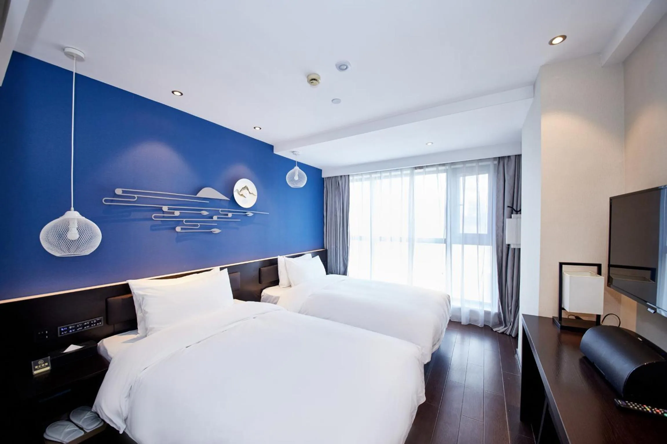 Bedroom, Bed in Orange Hotel Shanghai Hongkou Football Stadium Branch