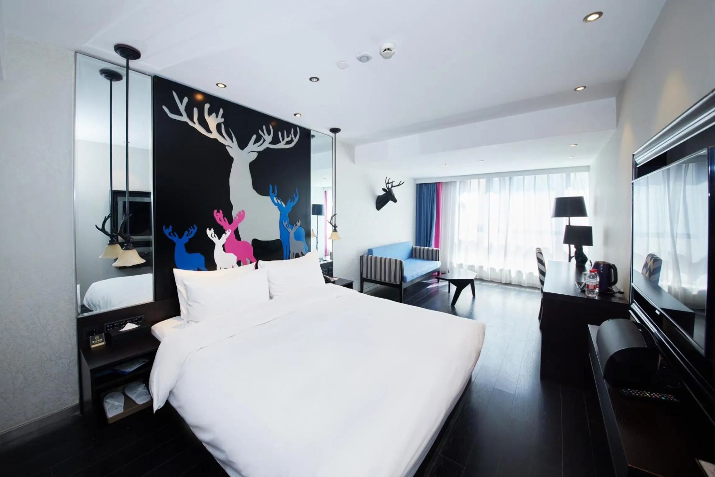 Bedroom, Bed in Orange Hotel Shanghai Hongkou Football Stadium Branch